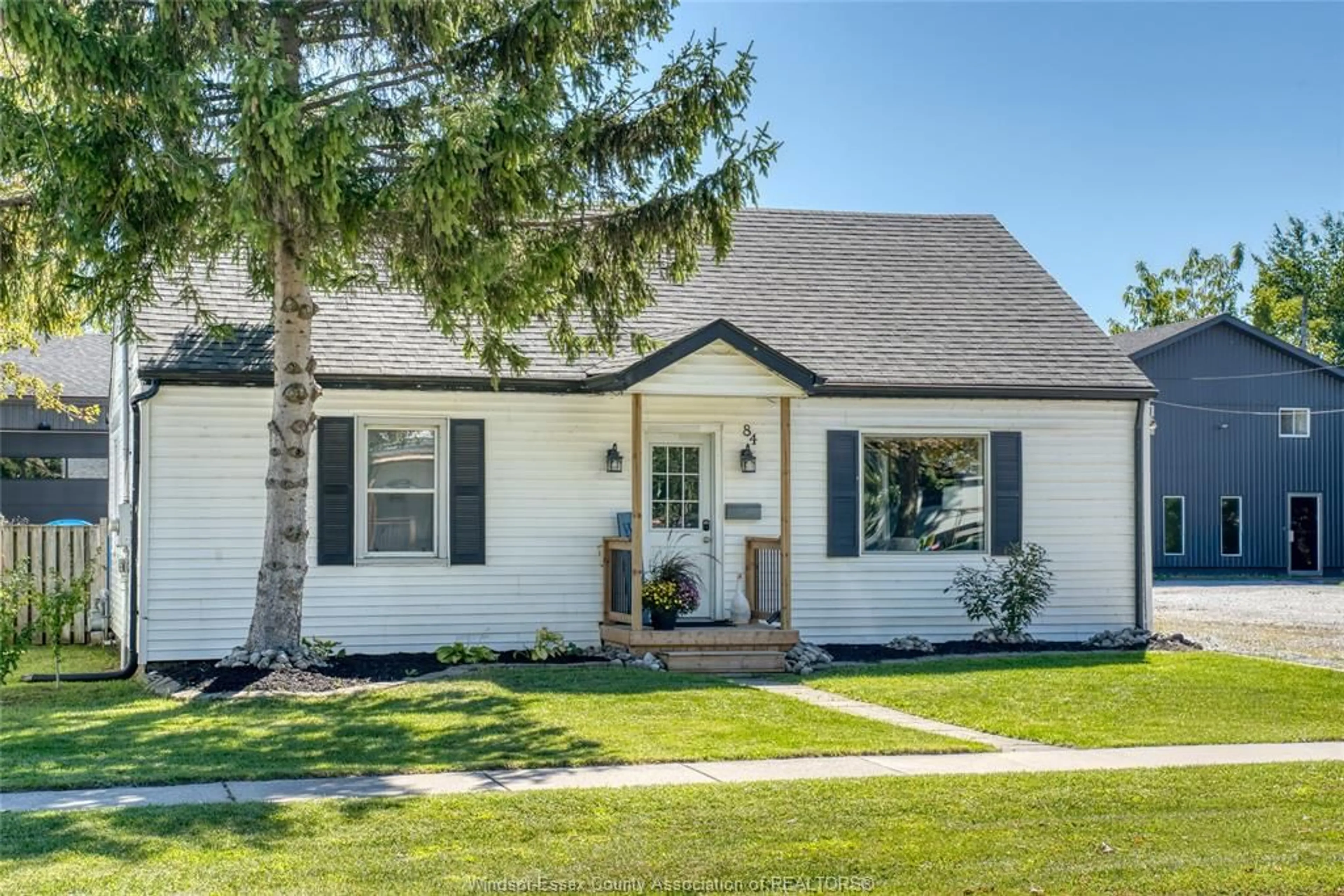 Home with vinyl exterior material, street for 84 CAMERON, Essex Ontario N8M 2L5