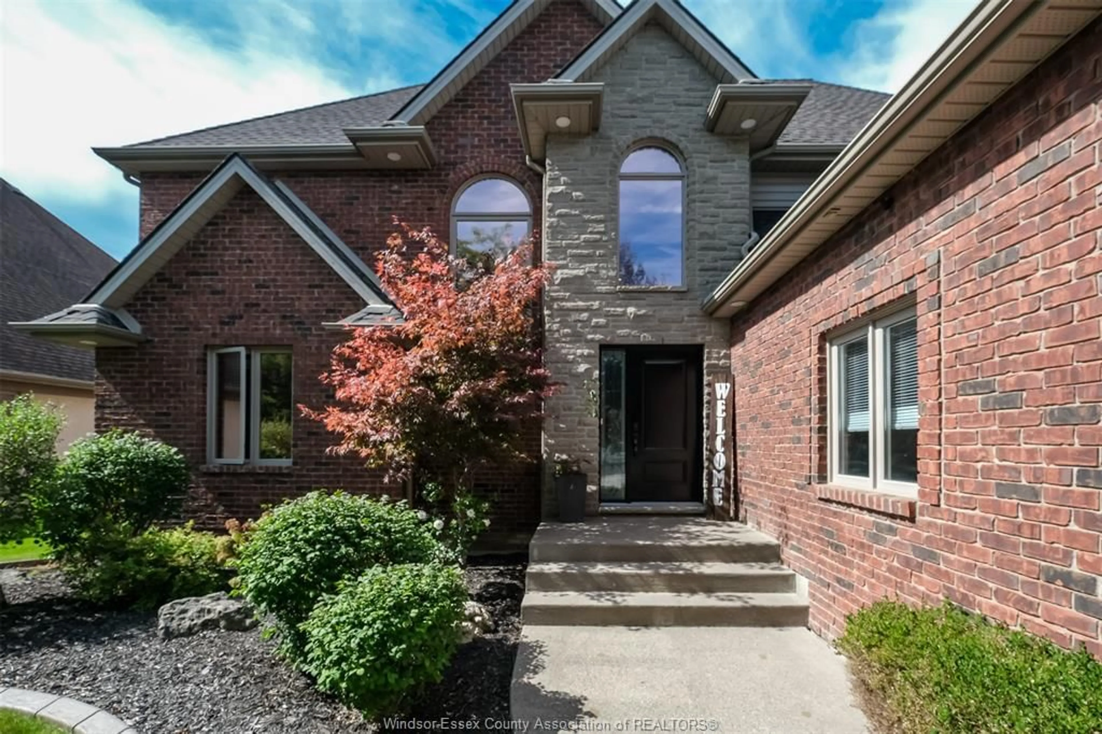 Home with brick exterior material, street for 369 PINEHURST Dr, Lakeshore Ontario N8L 0V8
