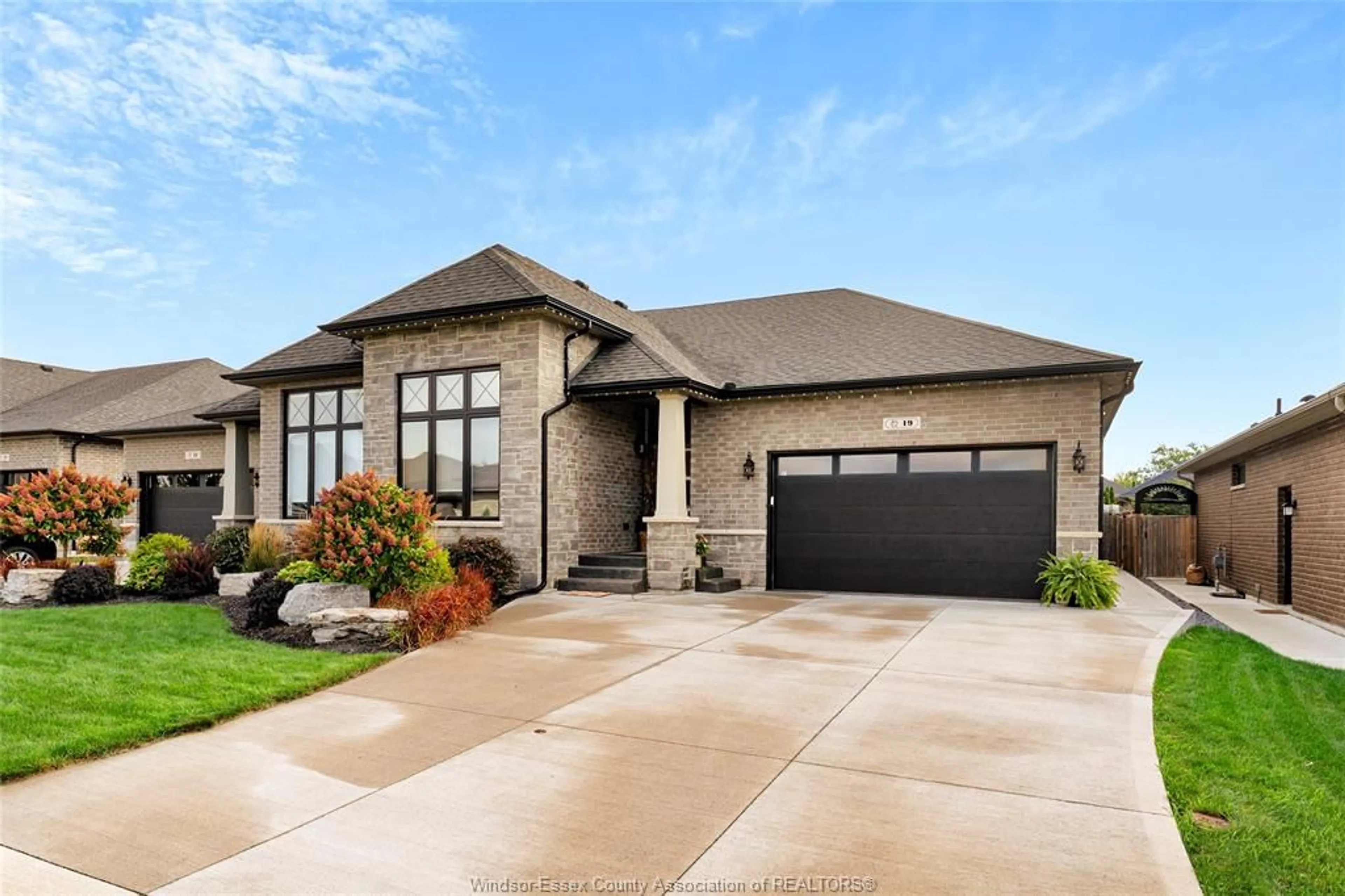 Home with brick exterior material, street for 19 LUKAS Dr, Kingsville Ontario N9Y 0E2