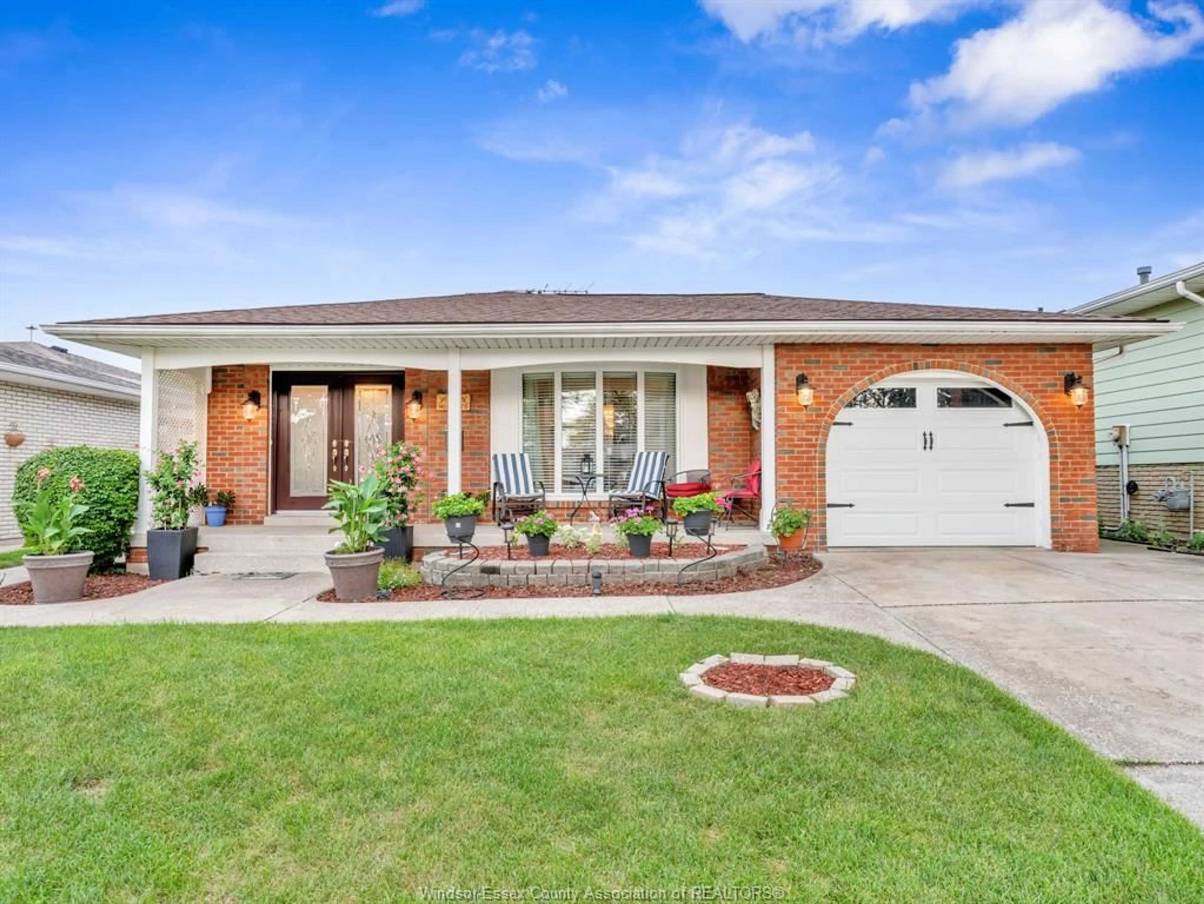 Home with brick exterior material, street for 9975 HOLLY Cres, Windsor Ontario N8R 1Y6