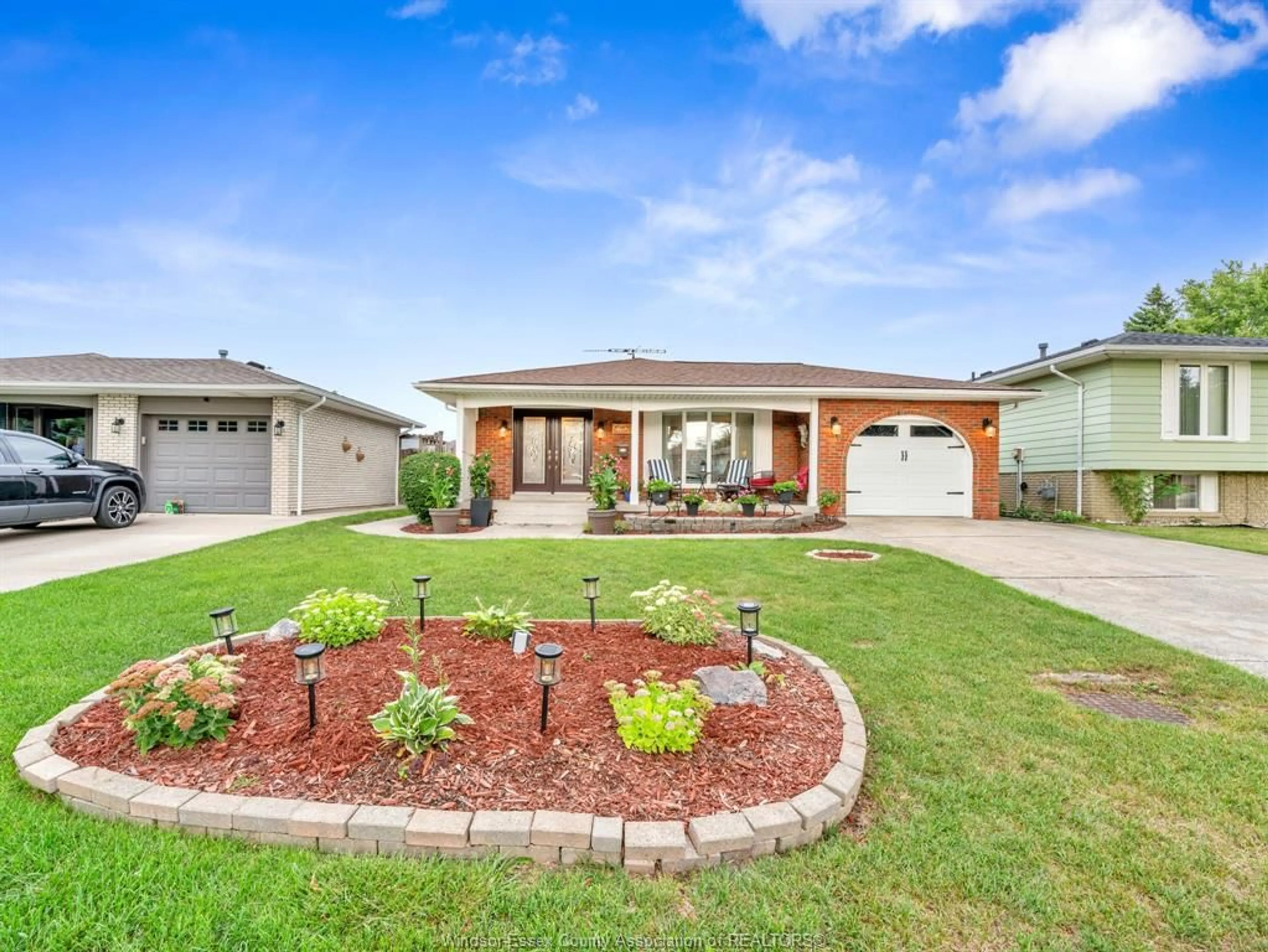 Home with brick exterior material, street for 9975 HOLLY Cres, Windsor Ontario N8R 1Y6