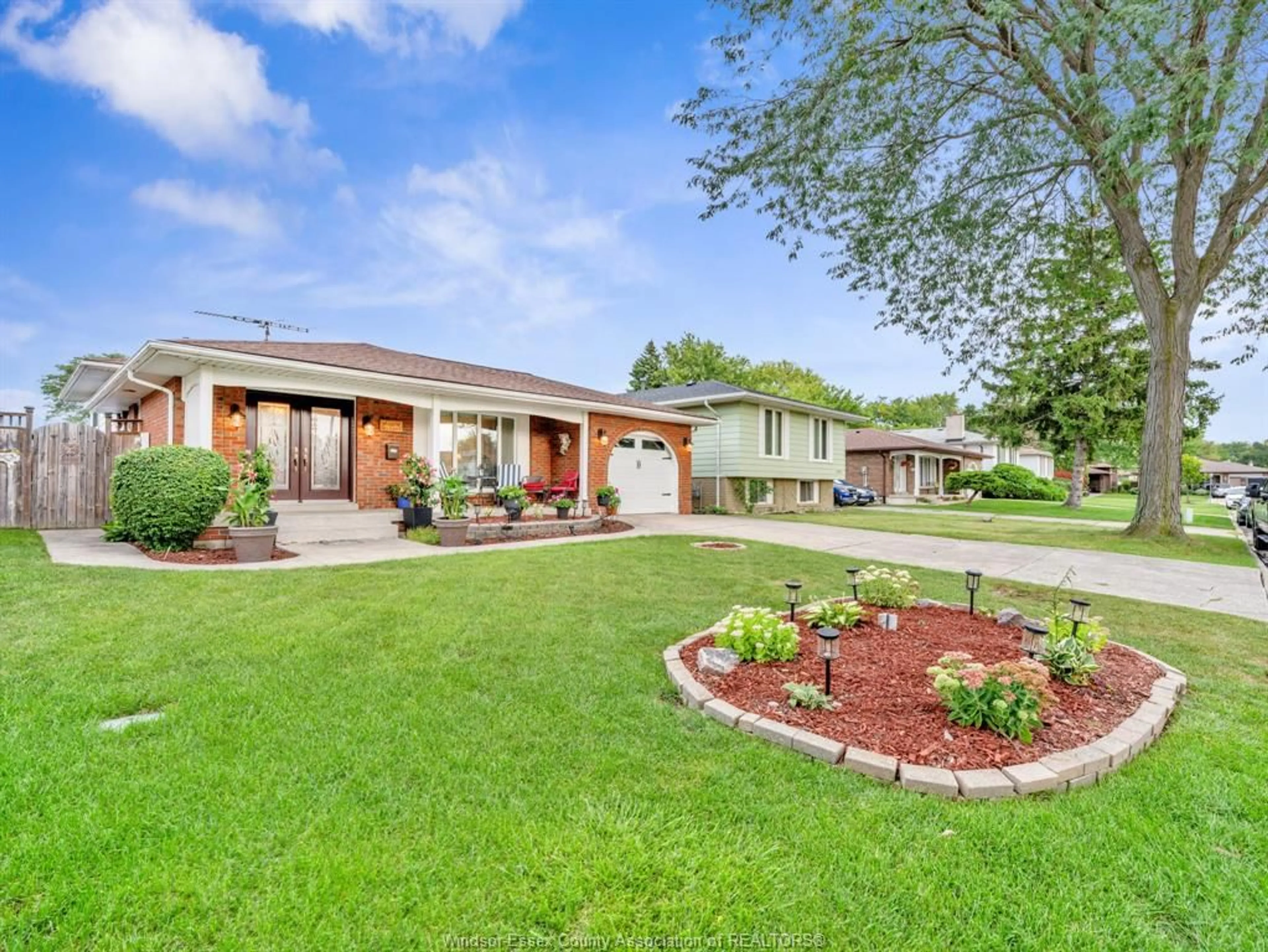 Home with brick exterior material, street for 9975 HOLLY Cres, Windsor Ontario N8R 1Y6