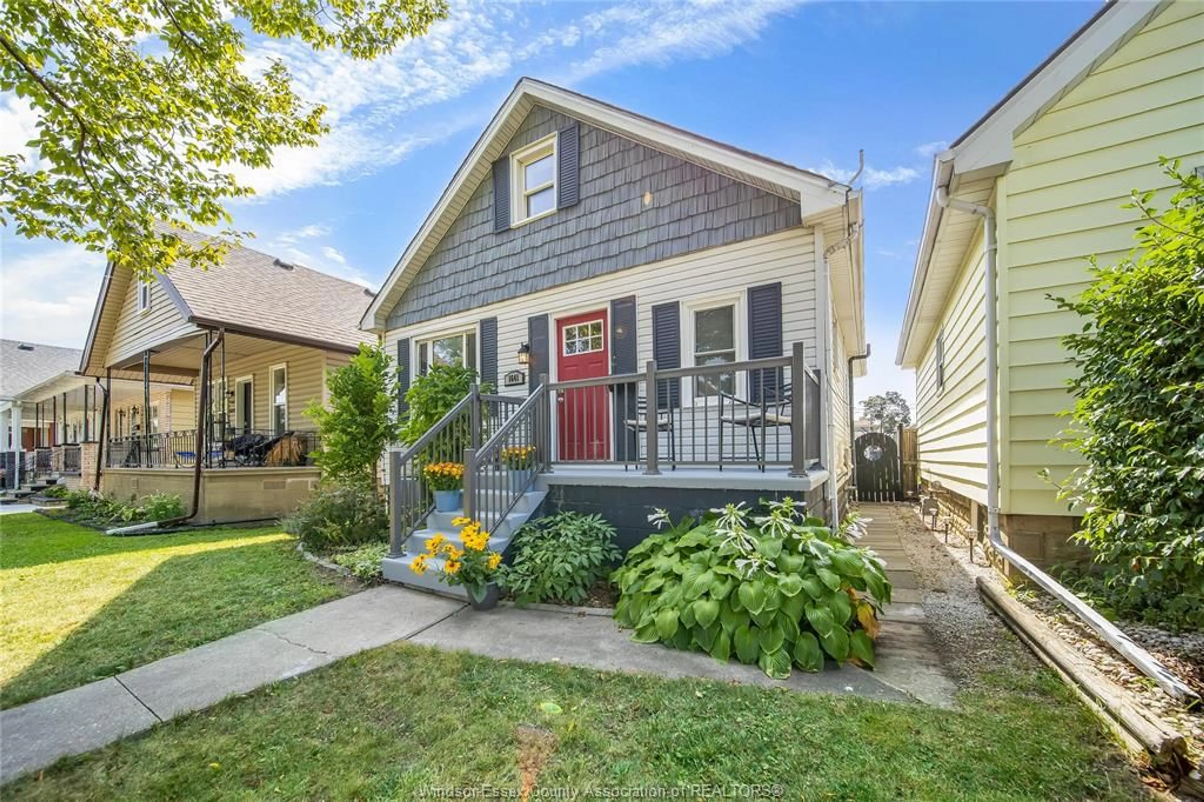Home with vinyl exterior material, street for 1641 HALL Ave, Windsor Ontario N8X 4S2