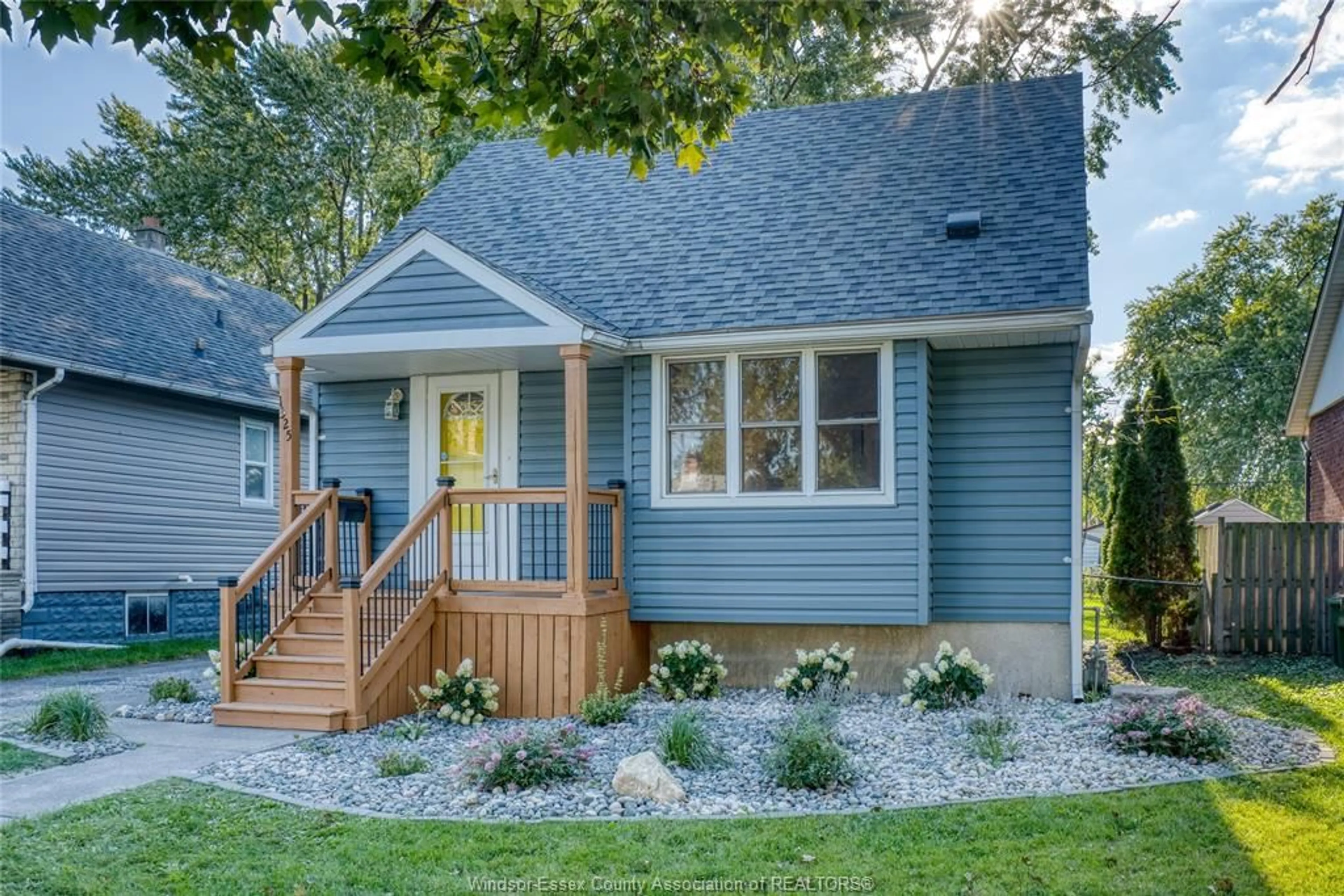 Home with vinyl exterior material, street for 1325 Bernard, Windsor Ontario N8Y 4K2