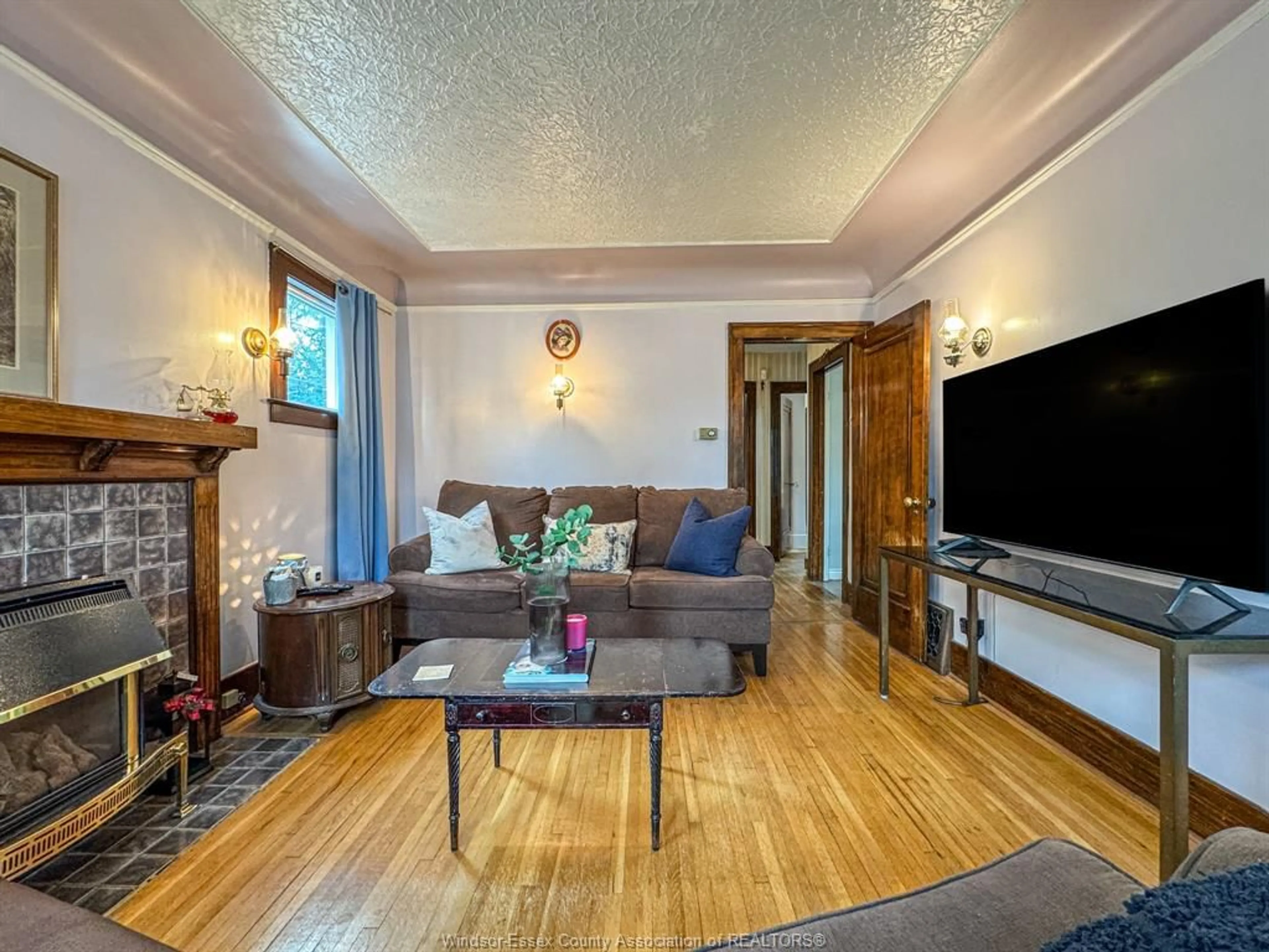 Living room with furniture, wood/laminate floor for 2270 LILLIAN, Windsor Ontario N8X 4B2