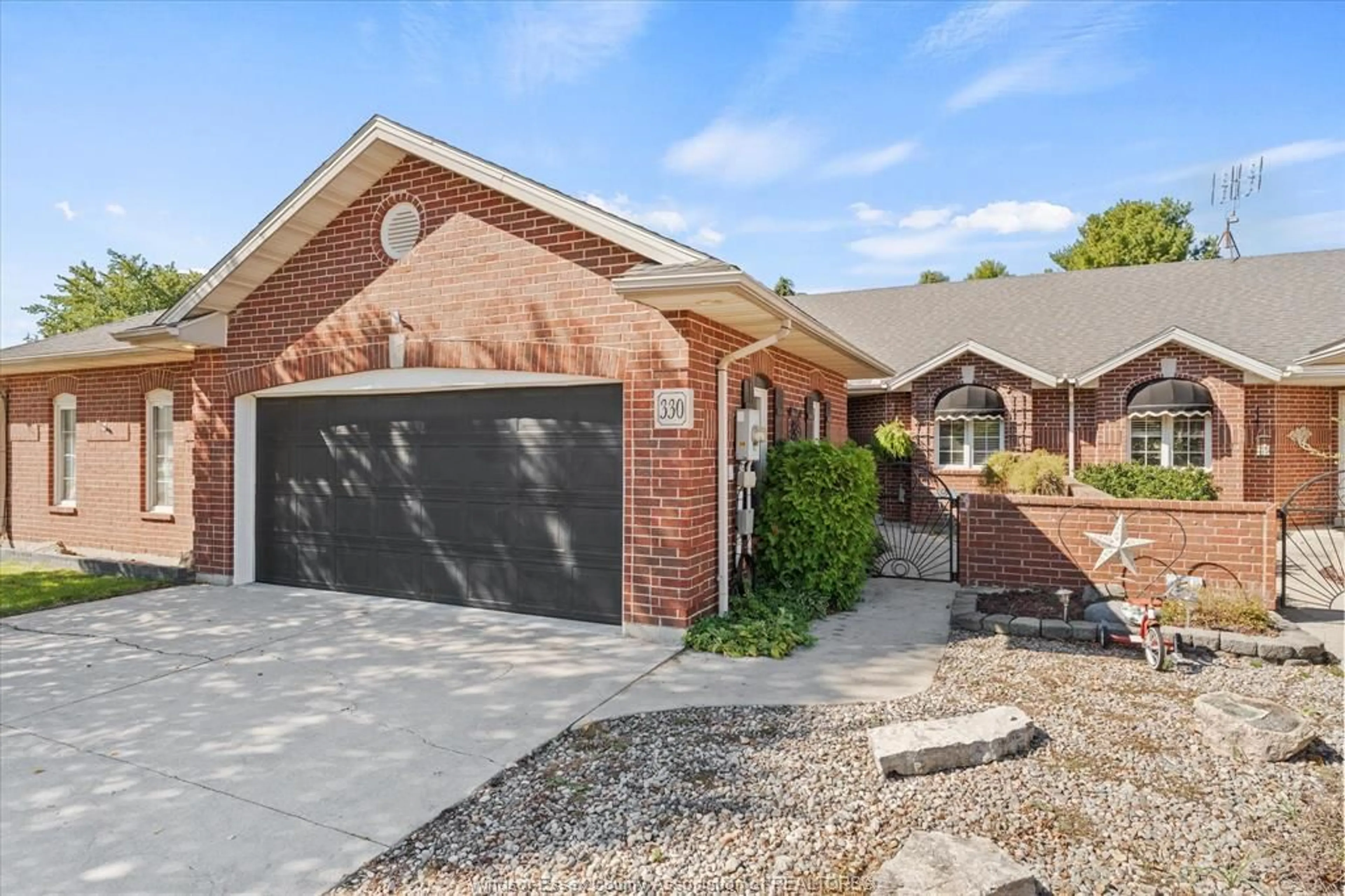 Home with brick exterior material, street for 330 SADDLE Lane, Kingsville Ontario N9Y 4A6