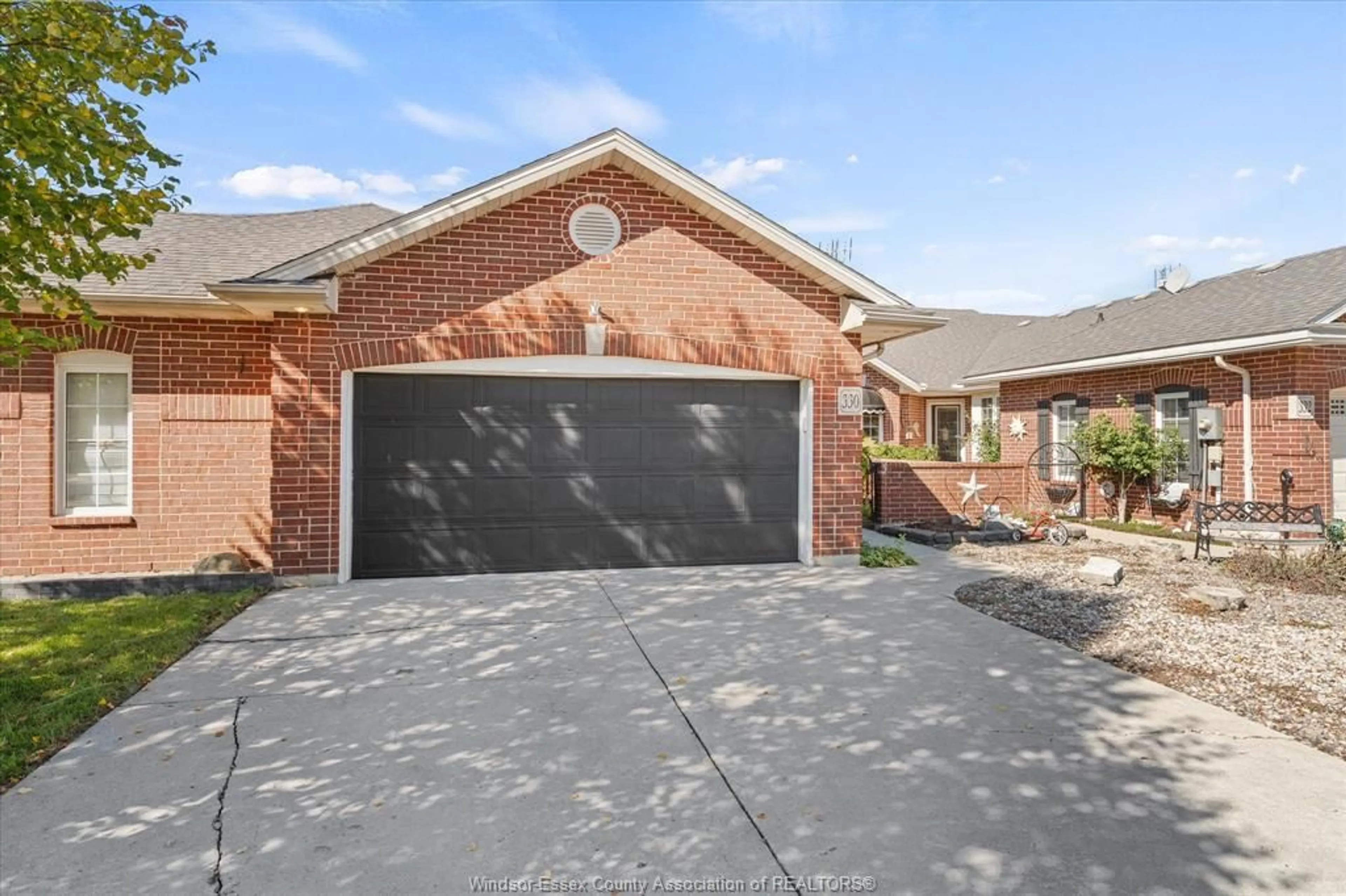 Home with brick exterior material, street for 330 SADDLE Lane, Kingsville Ontario N9Y 4A6