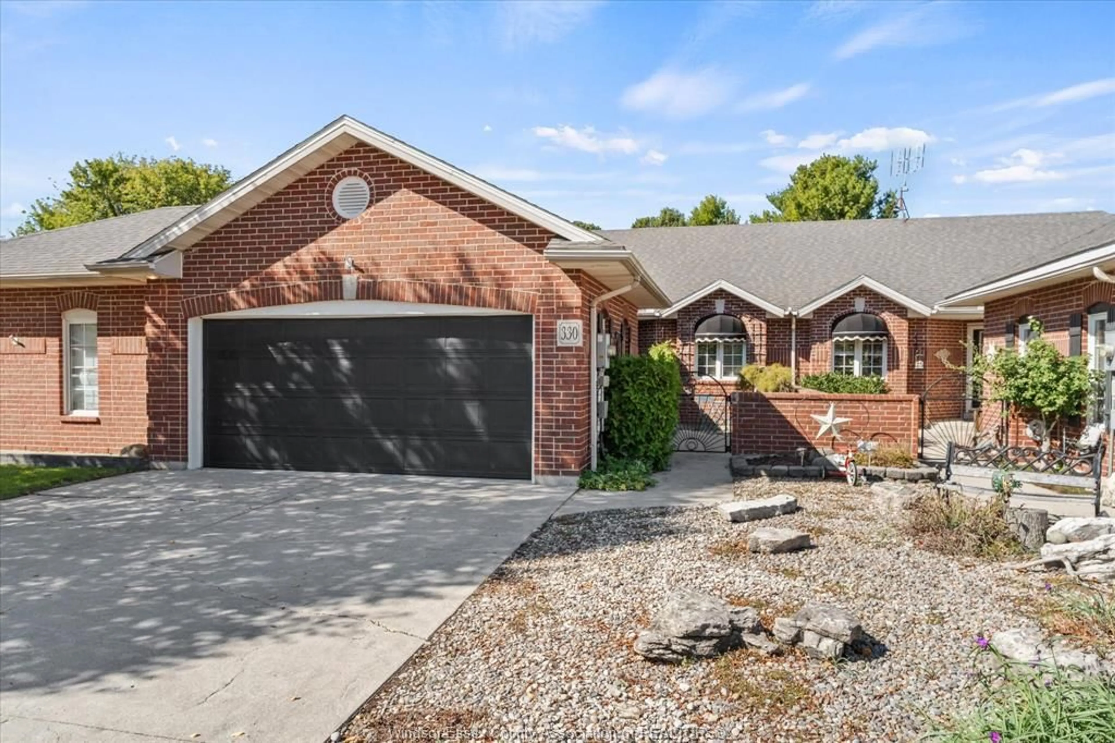 Home with brick exterior material, street for 330 SADDLE Lane, Kingsville Ontario N9Y 4A6