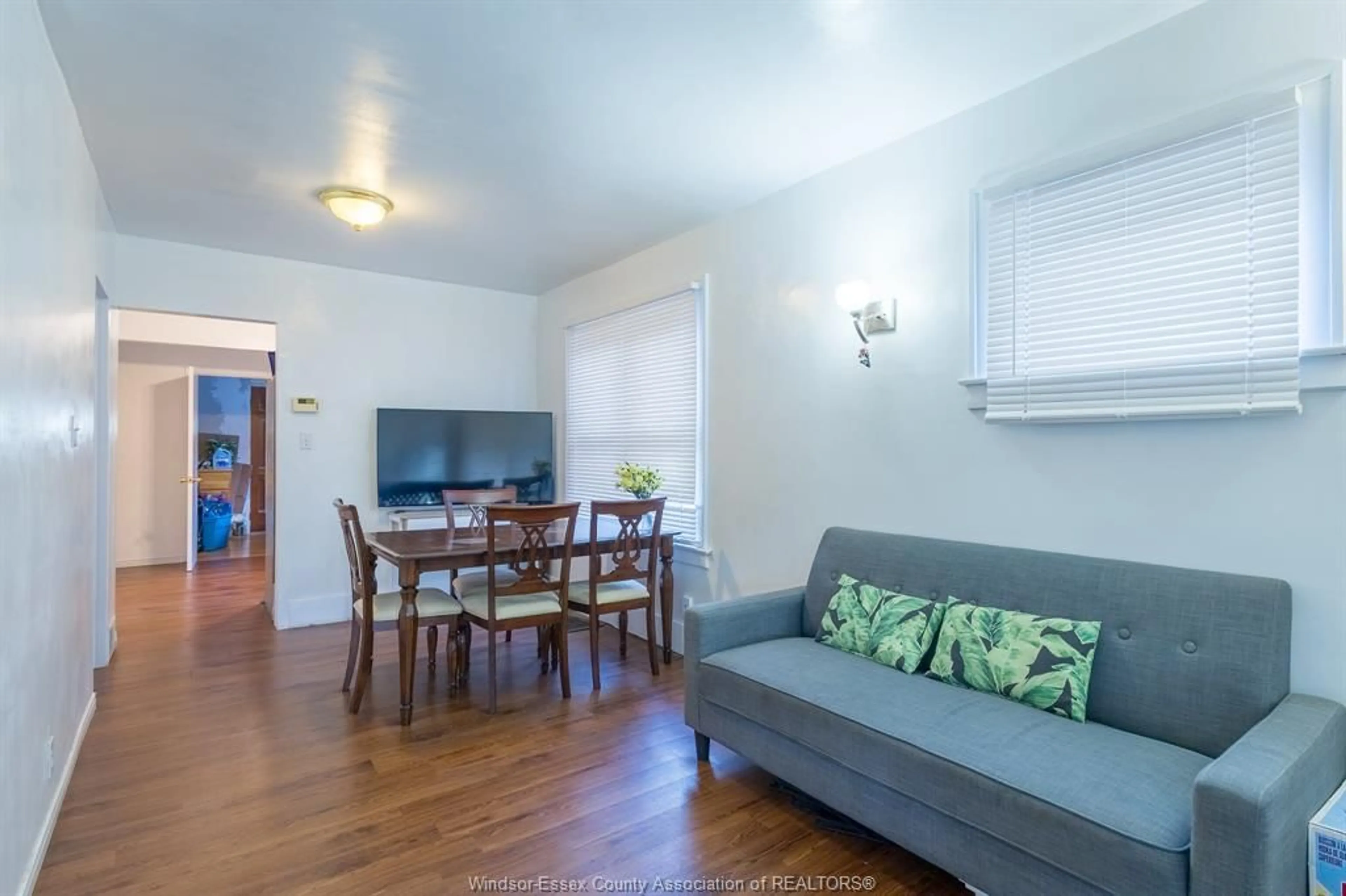 Living room with furniture, wood/laminate floor for 792 partington Ave, Windsor Ontario N9B 2N8