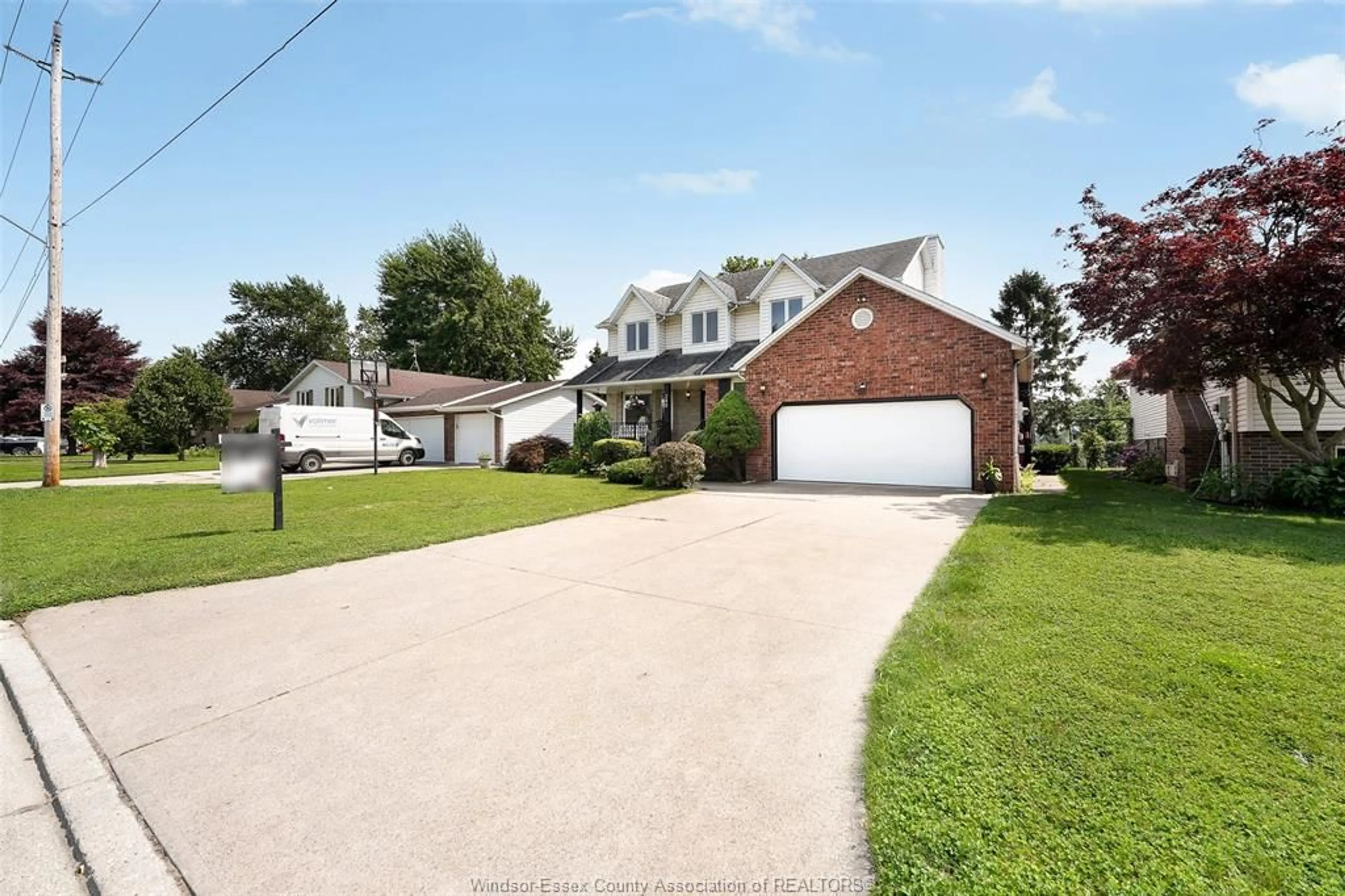 A pic from outside/outdoor area/front of a property/back of a property/a pic from drone, street for 240 Gary Ave, LaSalle Ontario N9J 1V2