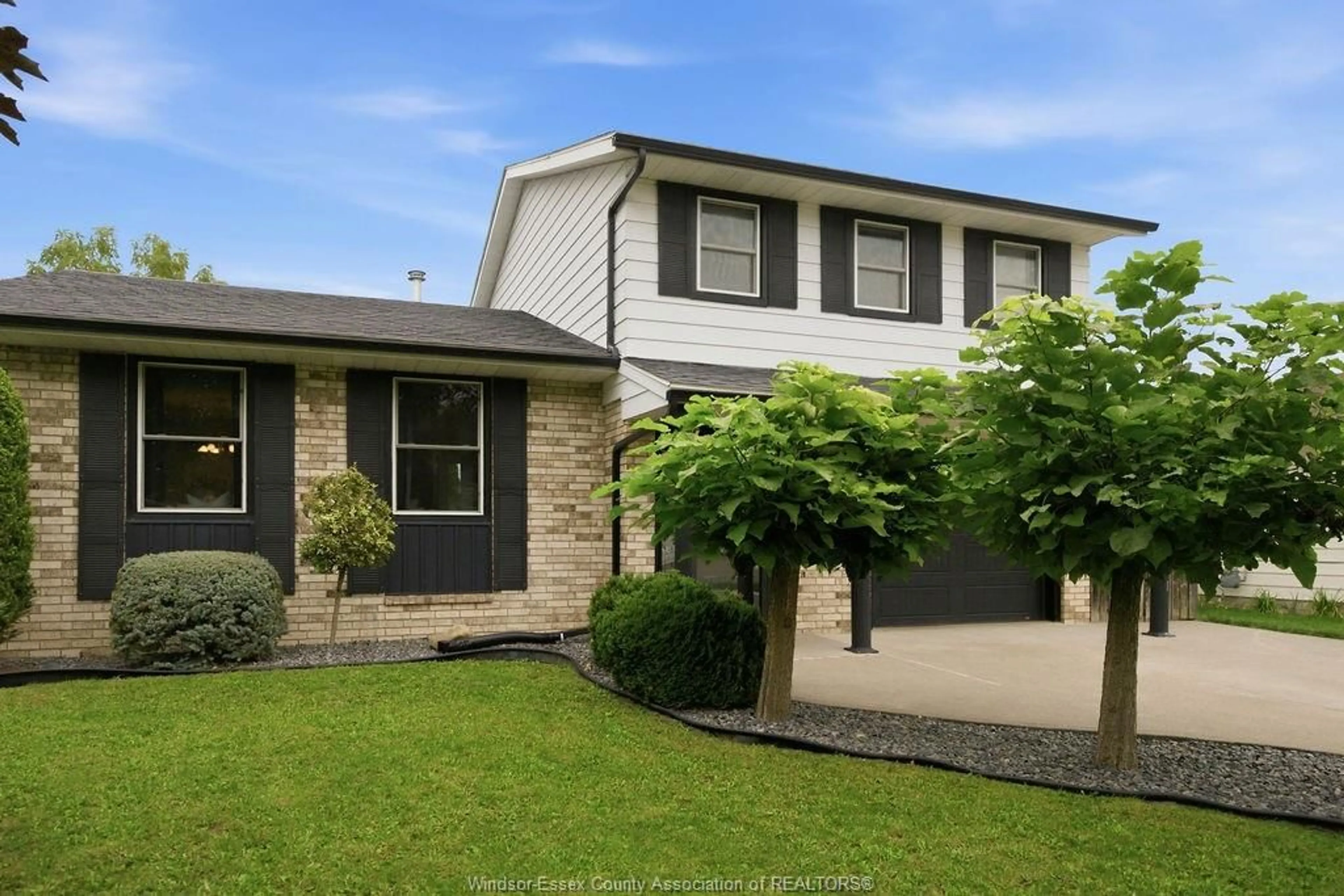 Home with brick exterior material, street for 12224 ST THOMAS Cres, Tecumseh Ontario N8N 3J9