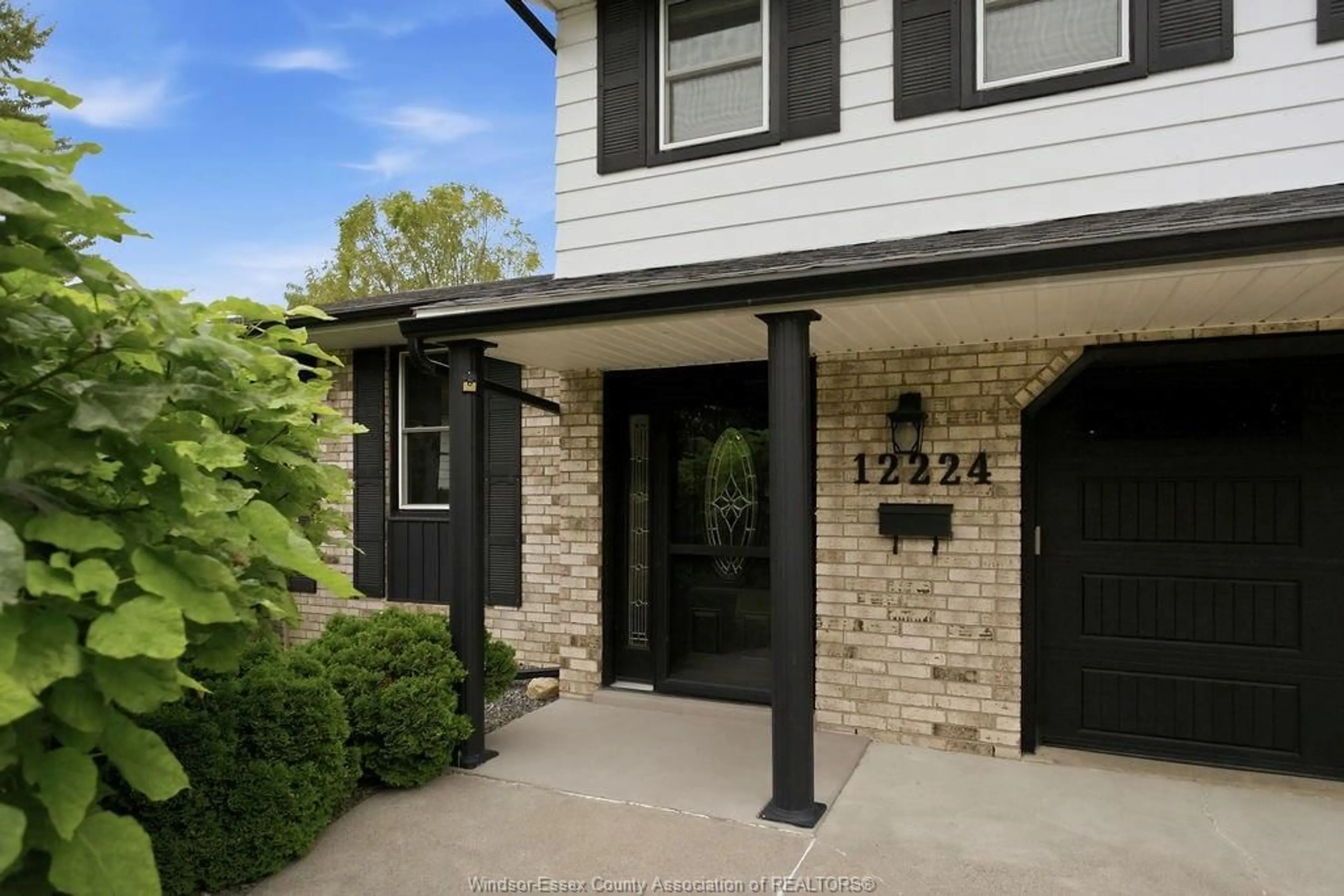 Home with brick exterior material, street for 12224 ST THOMAS Cres, Tecumseh Ontario N8N 3J9