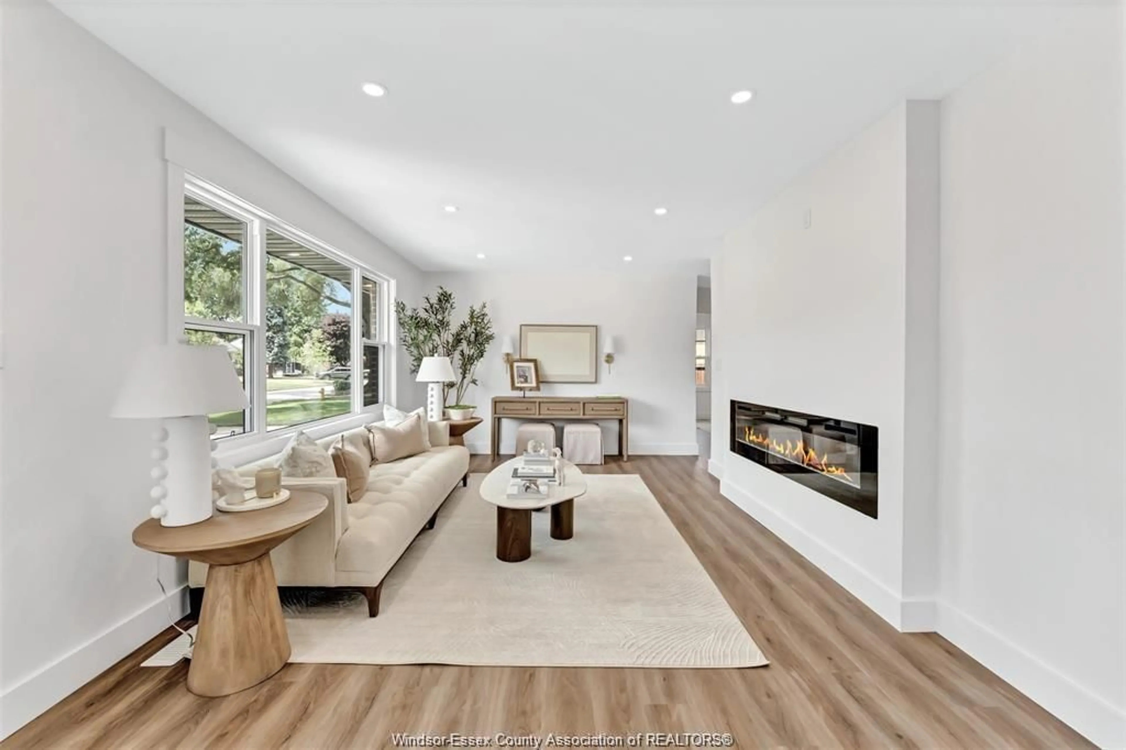 Living room with furniture, wood/laminate floor for 994 ISABELLE, Windsor Ontario N8S 3B2