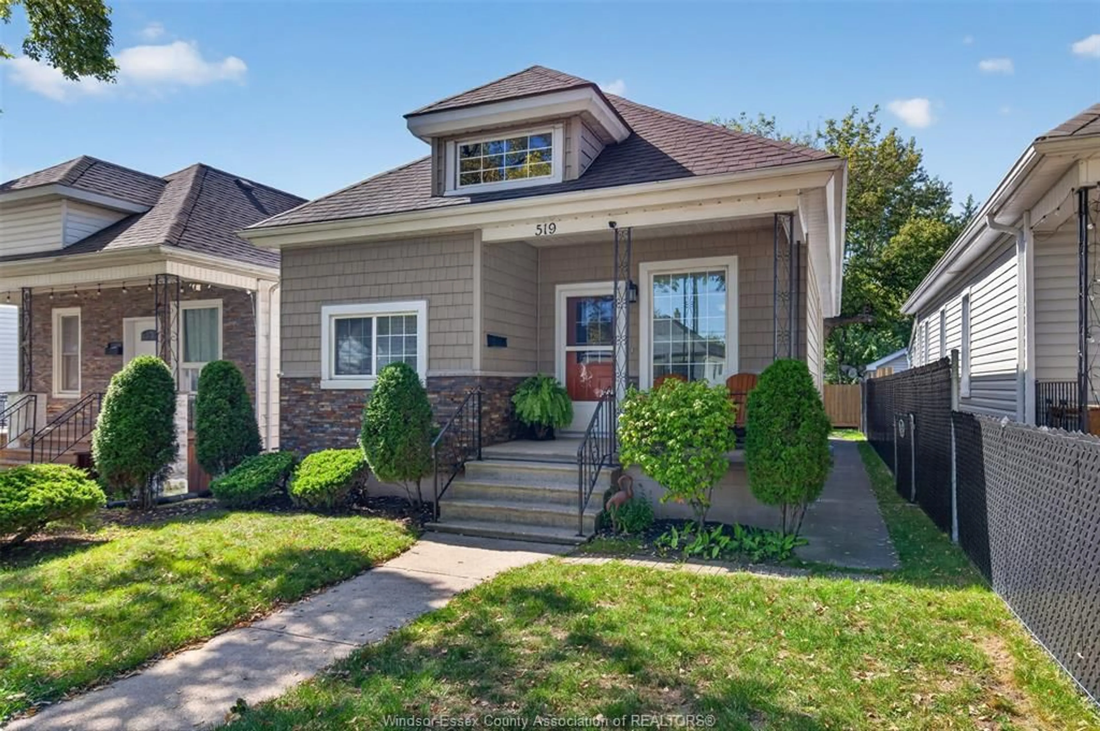 Home with vinyl exterior material, street for 519 MCKAY, Windsor Ontario N9B 1Z7