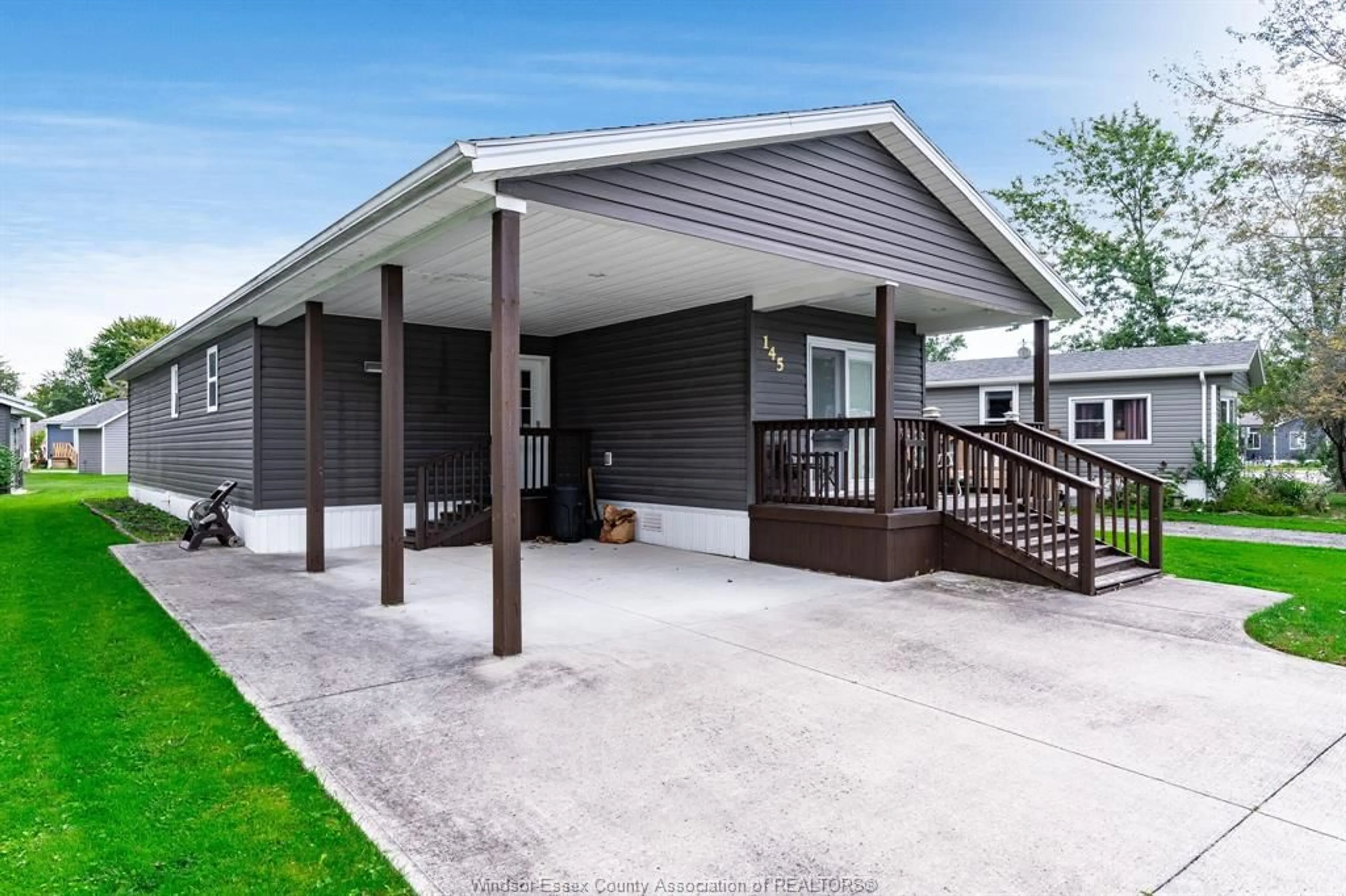 Home with vinyl exterior material, street for 145 Dana, Essex Ontario N8M 2A3