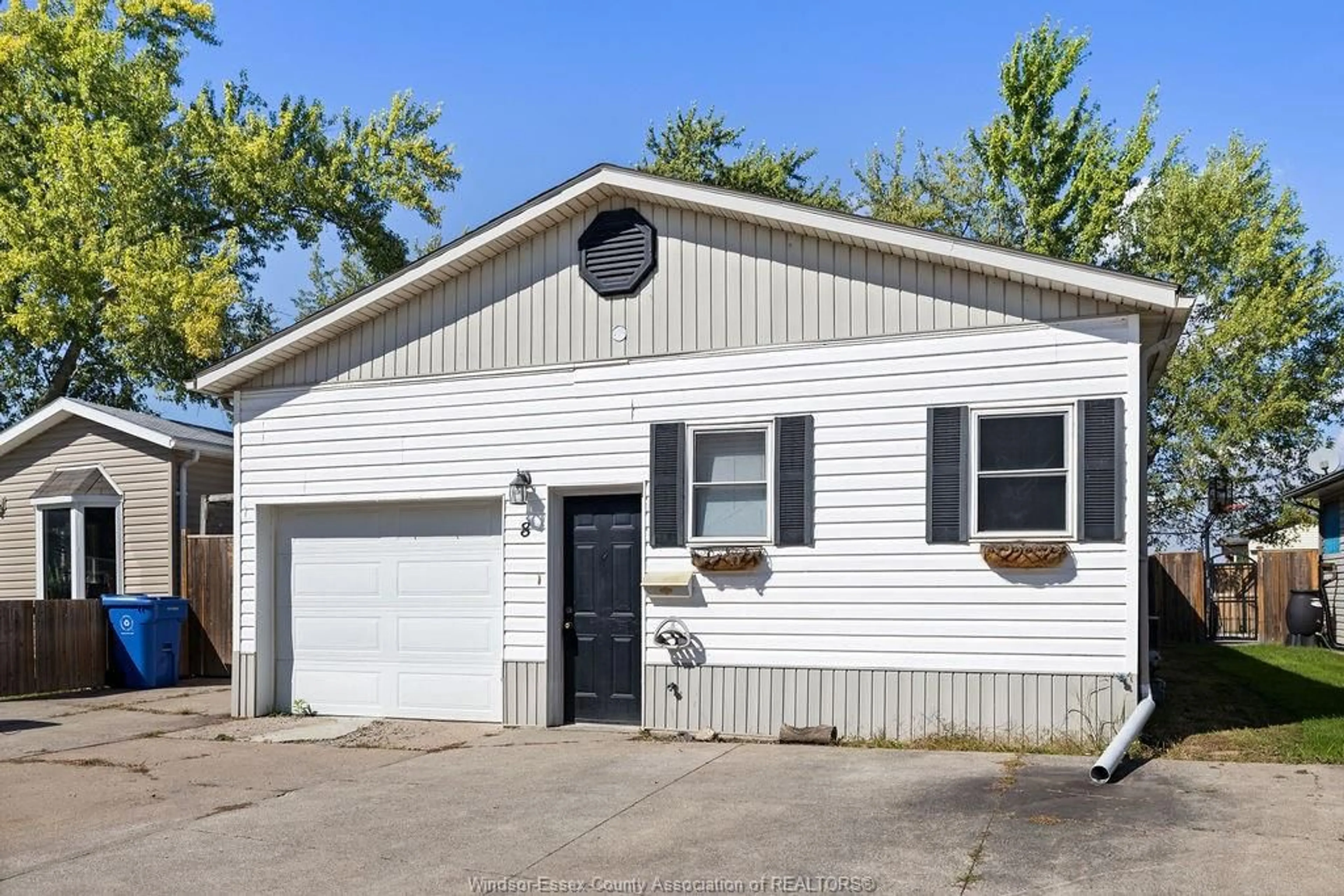 Home with vinyl exterior material, street for 8 SPRUCE, McGregor Ontario N0R 1J0