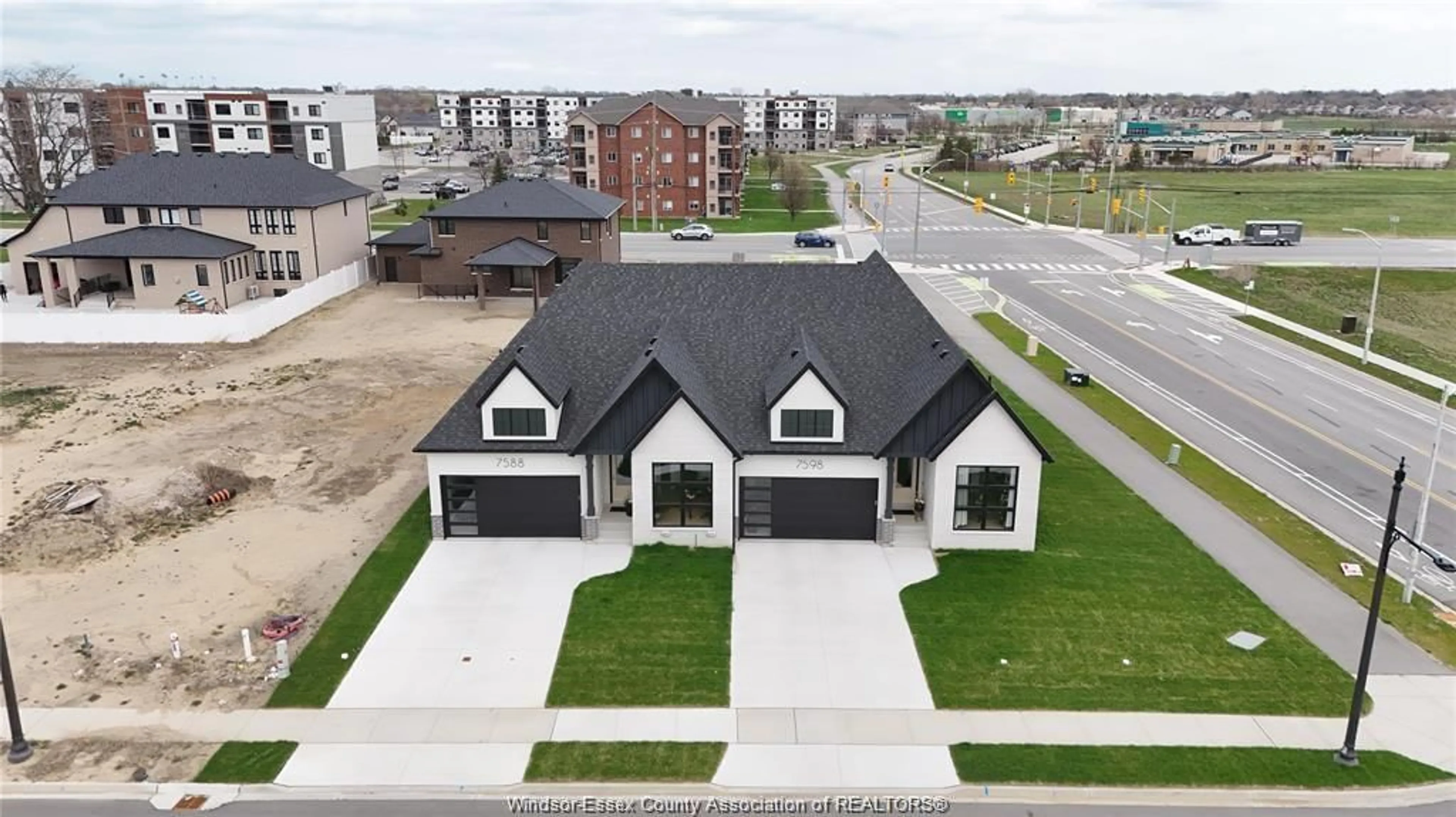 A pic from outside/outdoor area/front of a property/back of a property/a pic from drone, street for 7558 SILVERLEAF Lane, LaSalle Ontario N9H 1H3