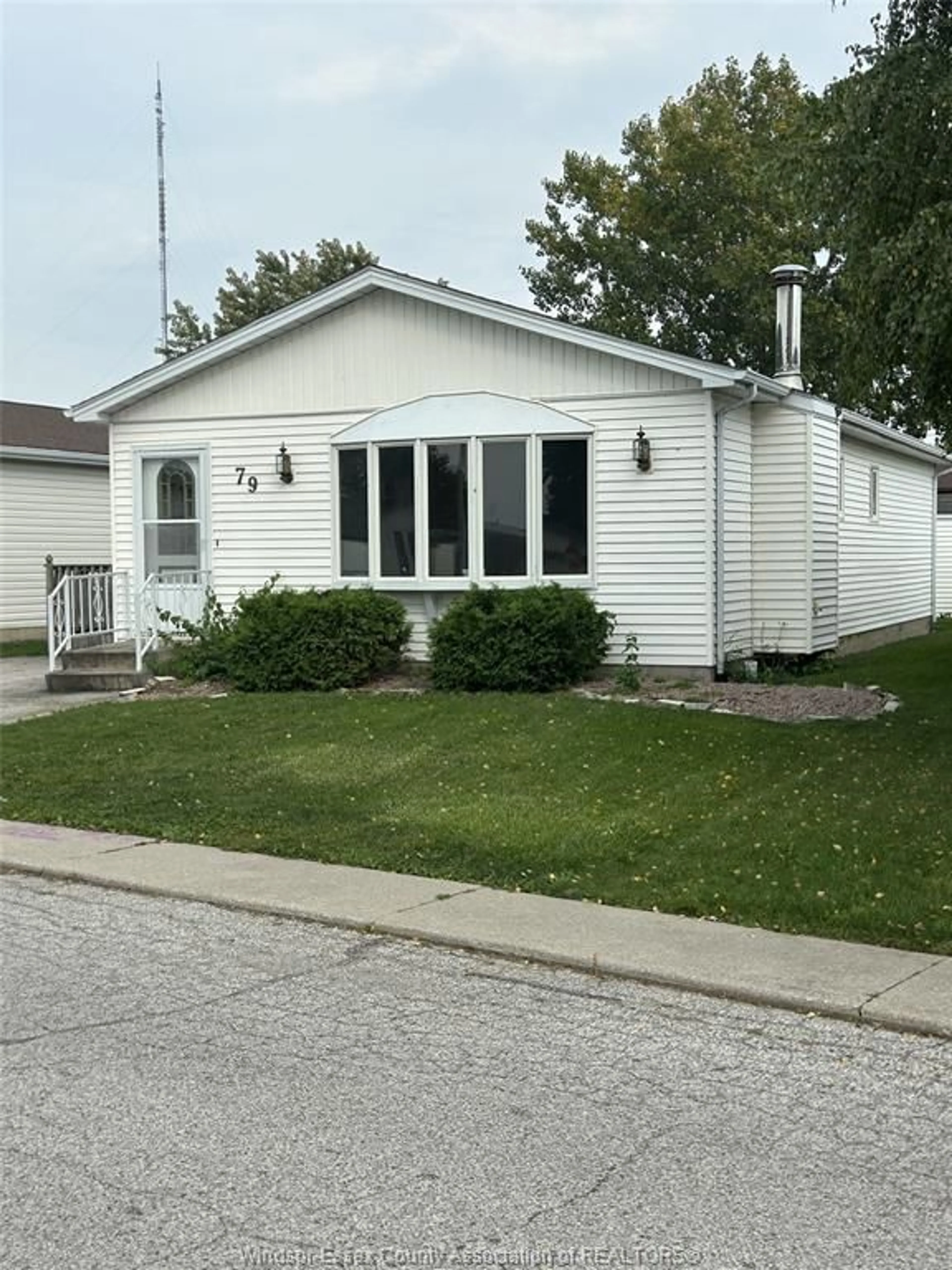 Home with vinyl exterior material, street for 79 PARKSIDE, McGregor Ontario N0R 1J0