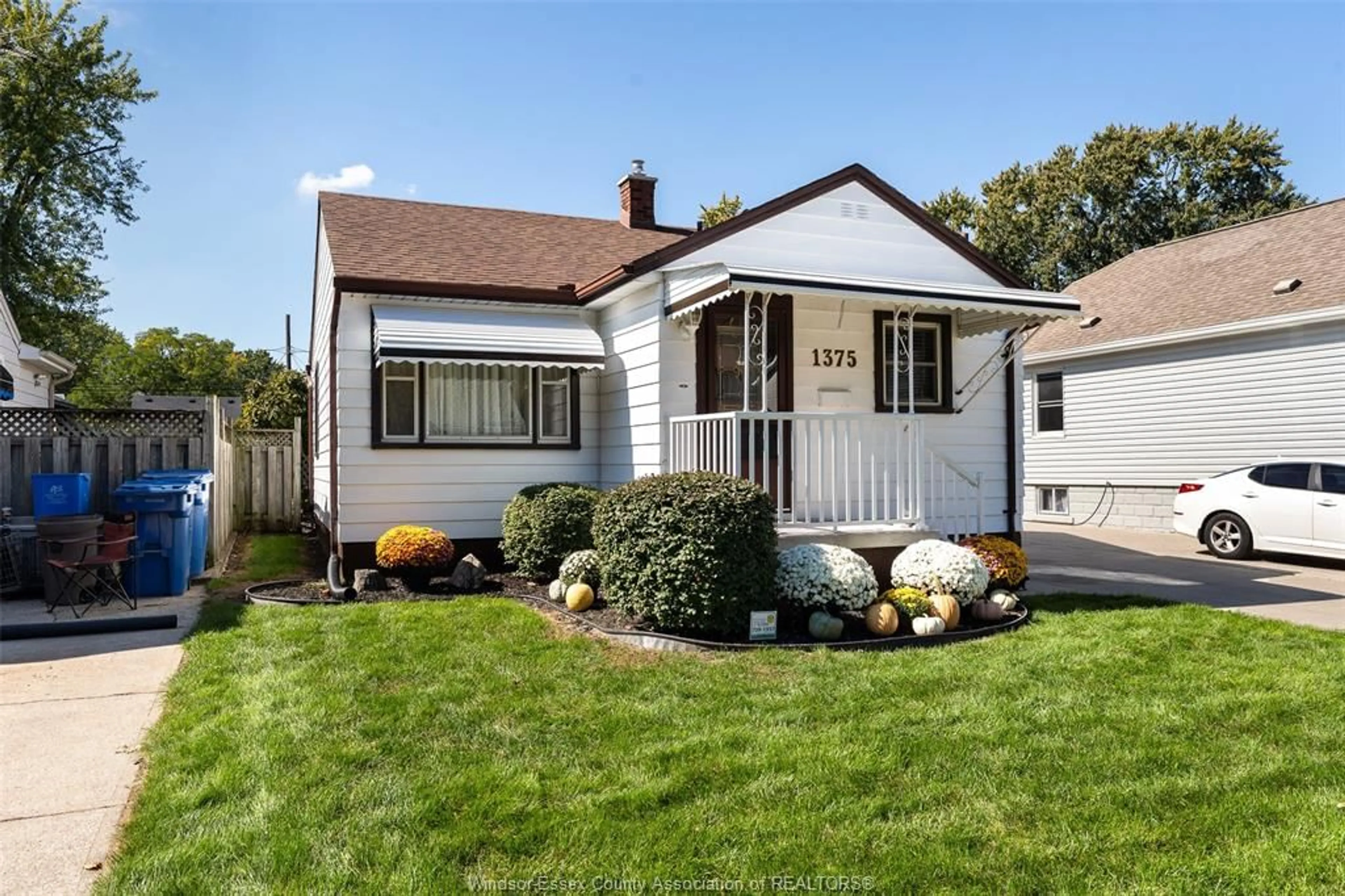 Home with vinyl exterior material, street for 1375 BERNARD Rd, Windsor Ontario N8Y 4K2