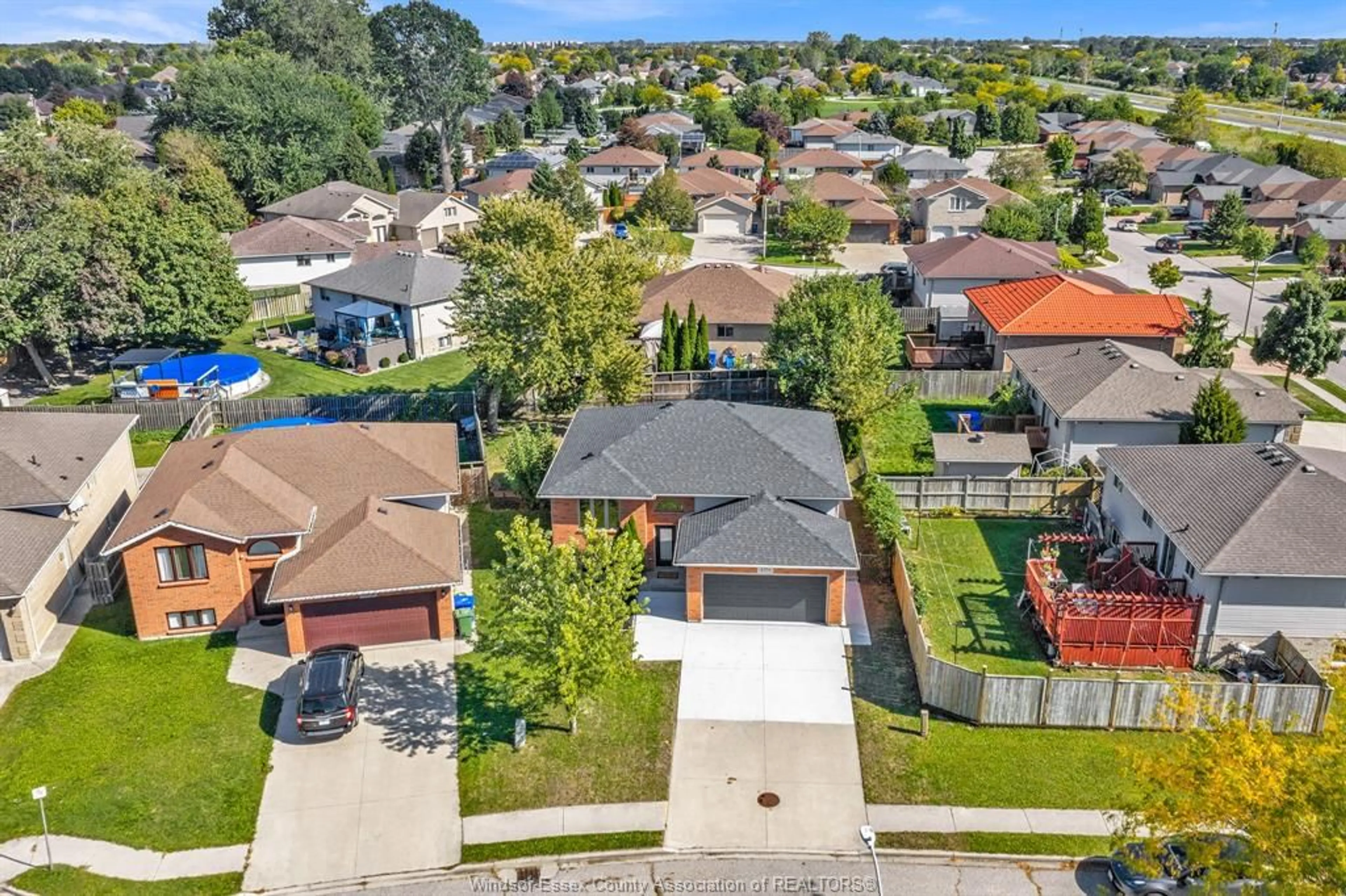 A pic from outside/outdoor area/front of a property/back of a property/a pic from drone, street for 4274 DENNISON Crt, Windsor Ontario N9G 2Y8