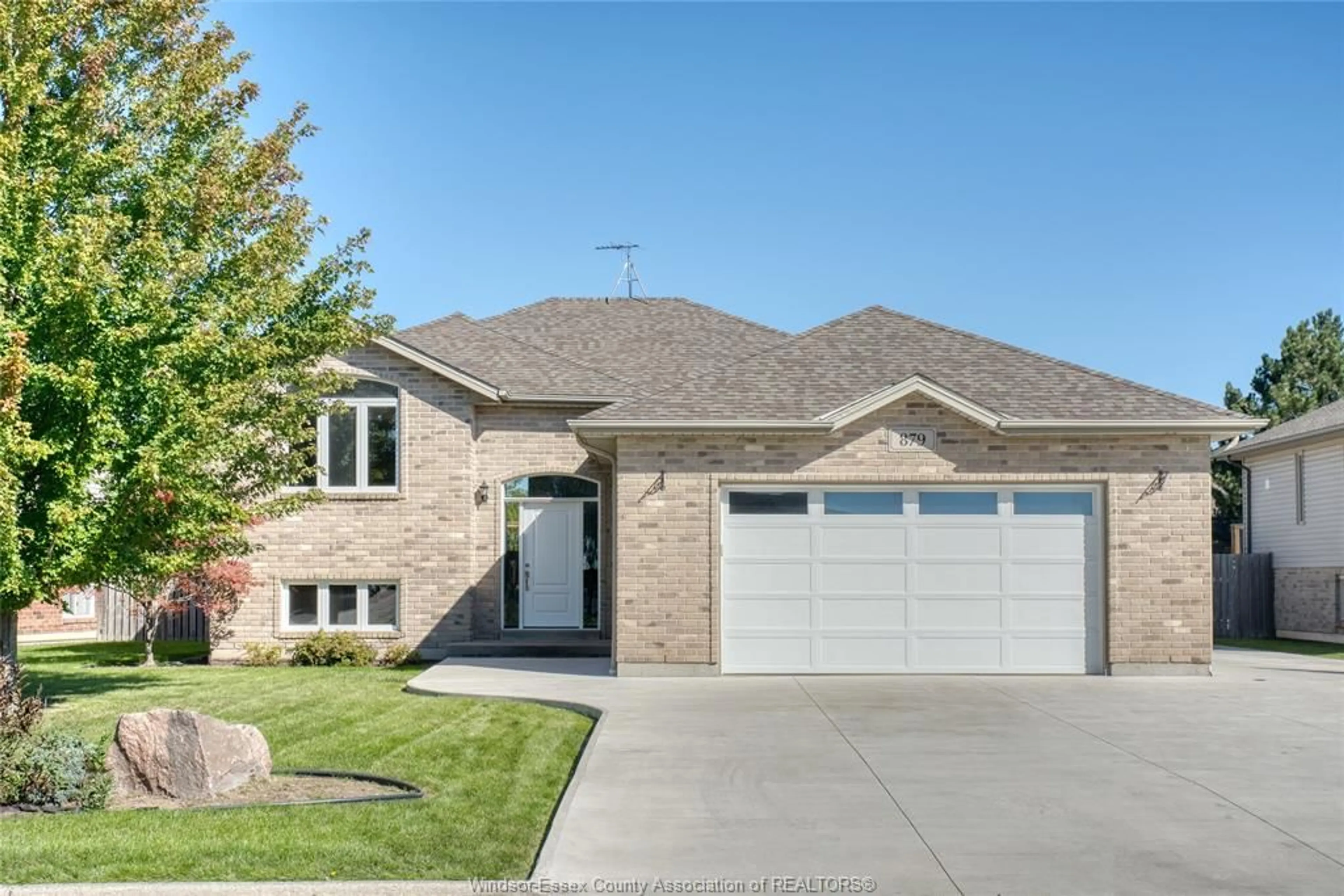 Home with brick exterior material, street for 879 WESTWOOD, Lakeshore Ontario N8L 1E9