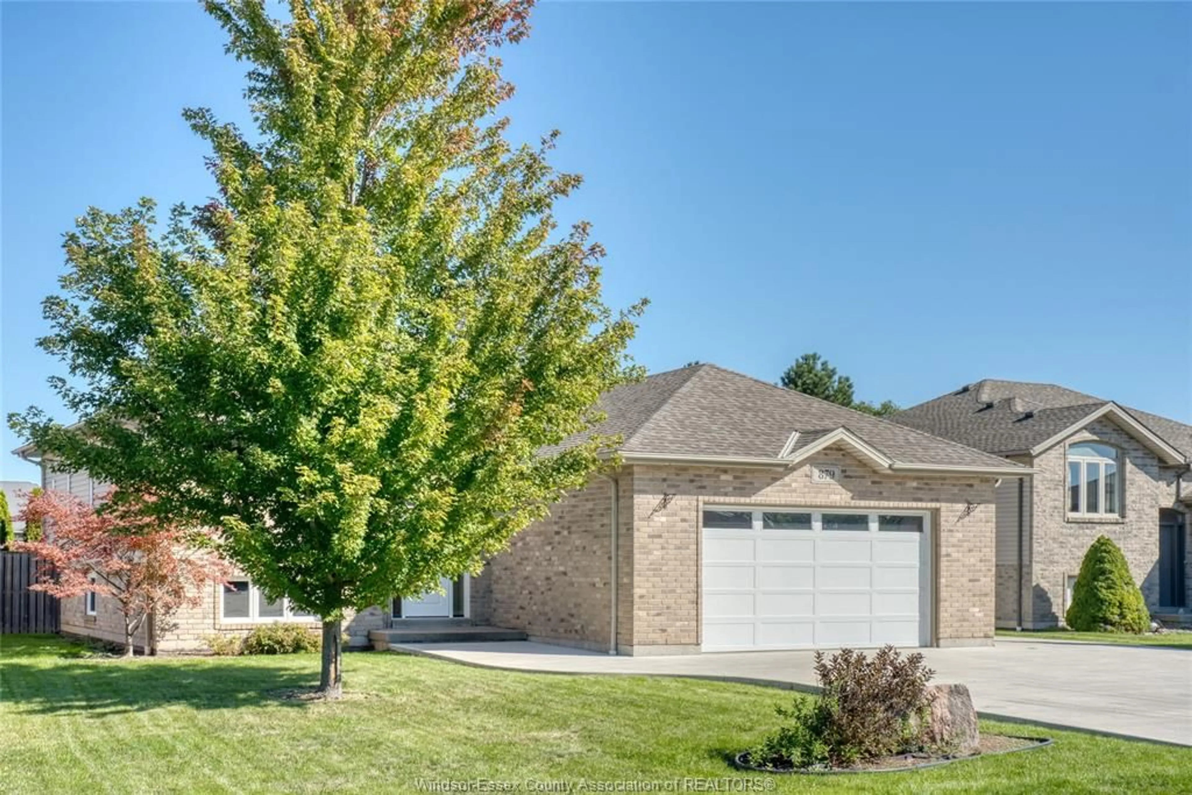 Home with brick exterior material, street for 879 WESTWOOD, Lakeshore Ontario N8L 1E9