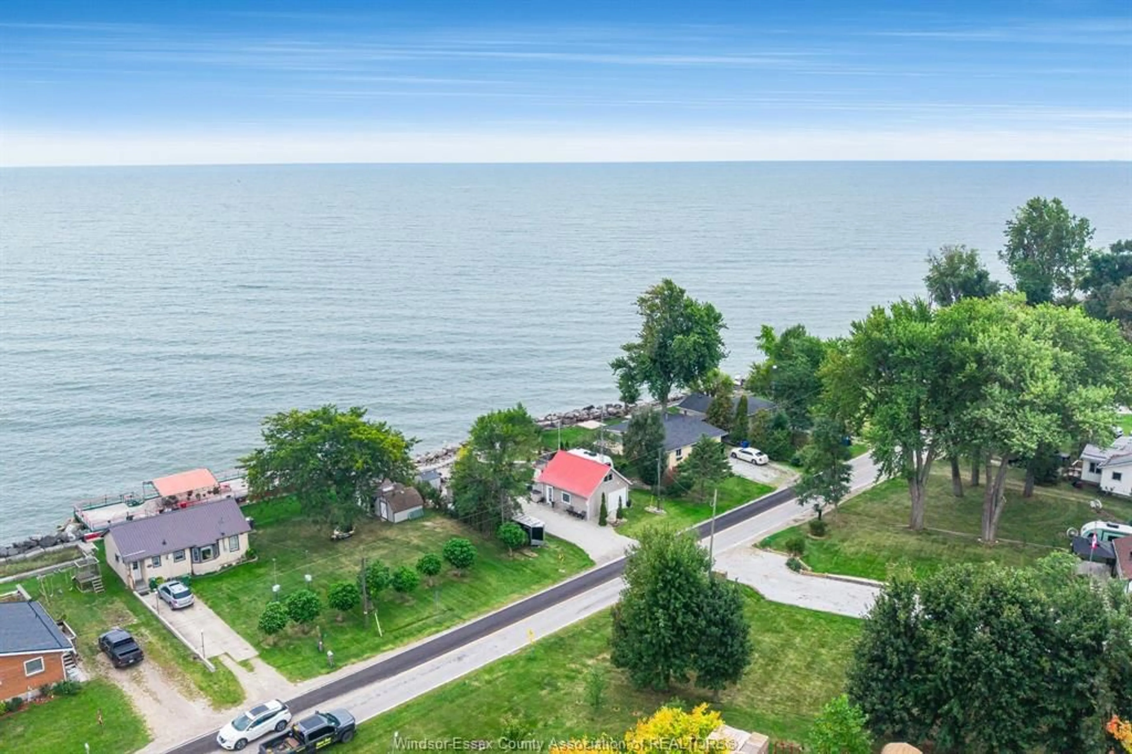 A pic from outside/outdoor area/front of a property/back of a property/a pic from drone, water/lake/river/ocean view for 170 Lakeshore Rd, Leamington Ontario N0P 2P0
