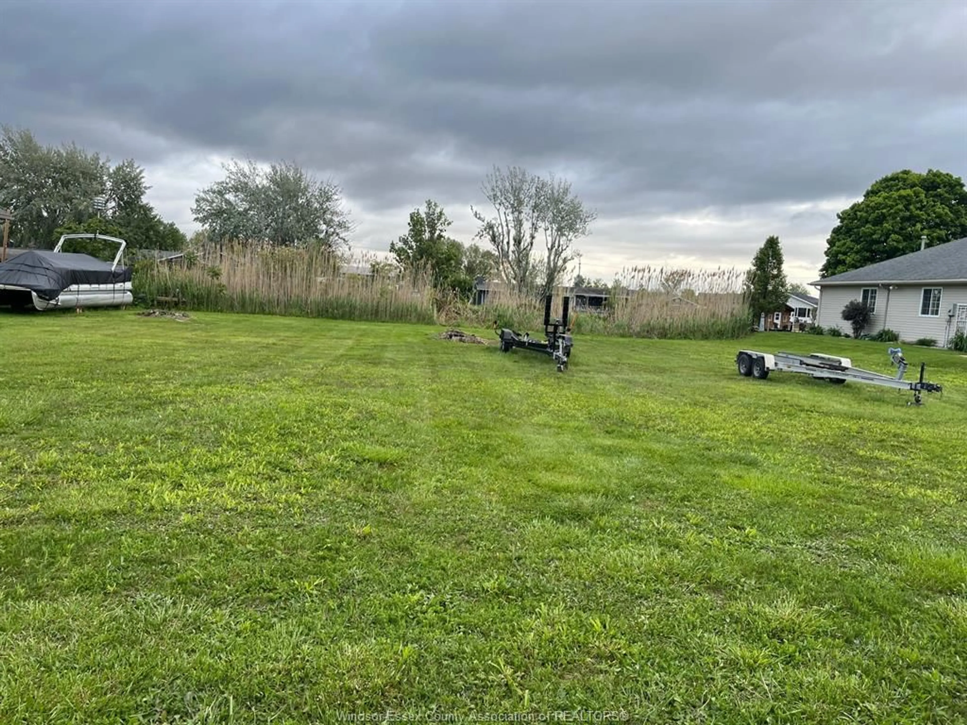 A pic from outside/outdoor area/front of a property/back of a property/a pic from drone, unknown for 580 MARKHAM Dr, Lakeshore Ontario N0P 2L0