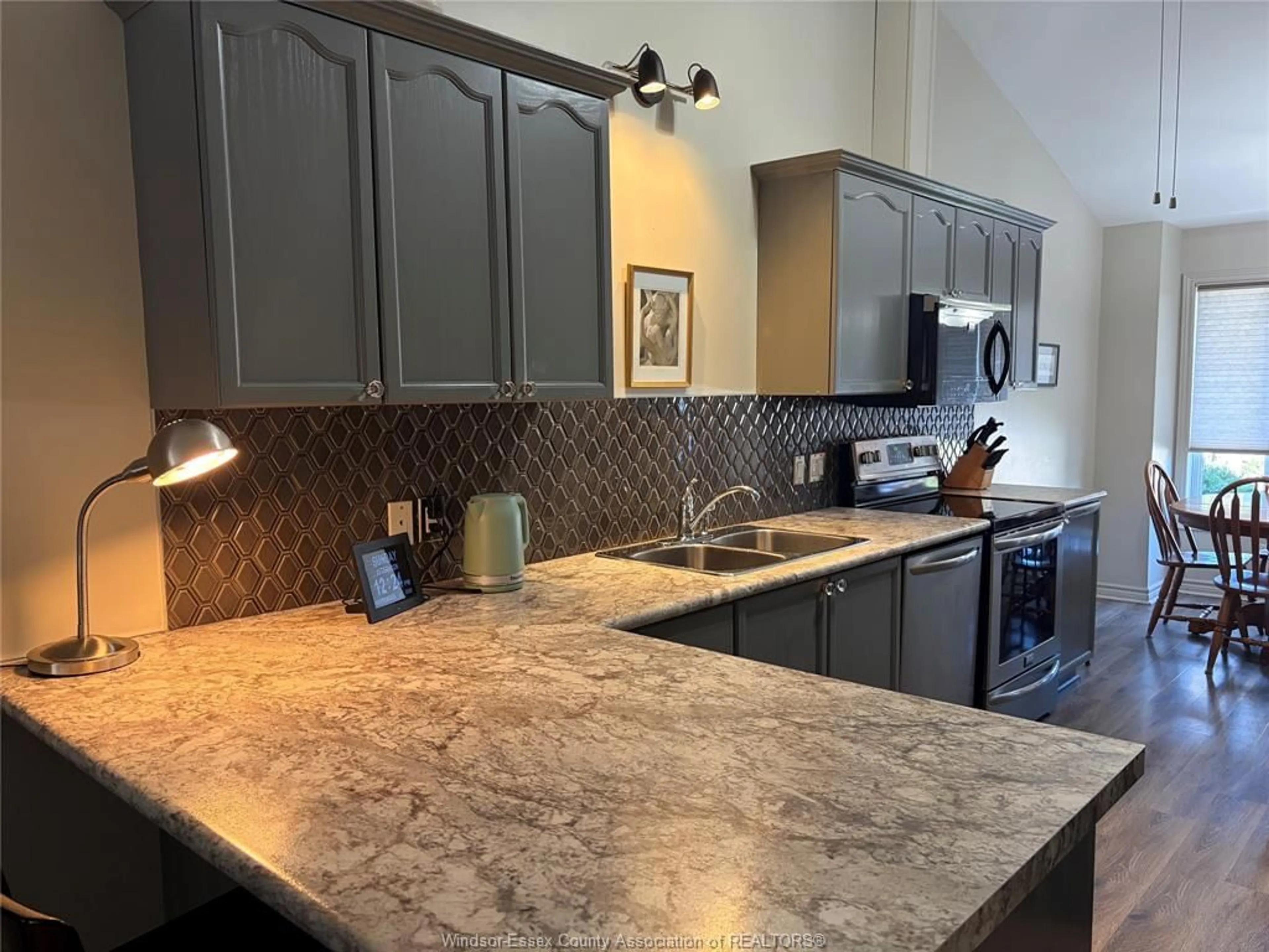 Open concept kitchen, ceramic/tile floor for 24 ERIE GLEN Cres, Leamington Ontario N8H 5K2