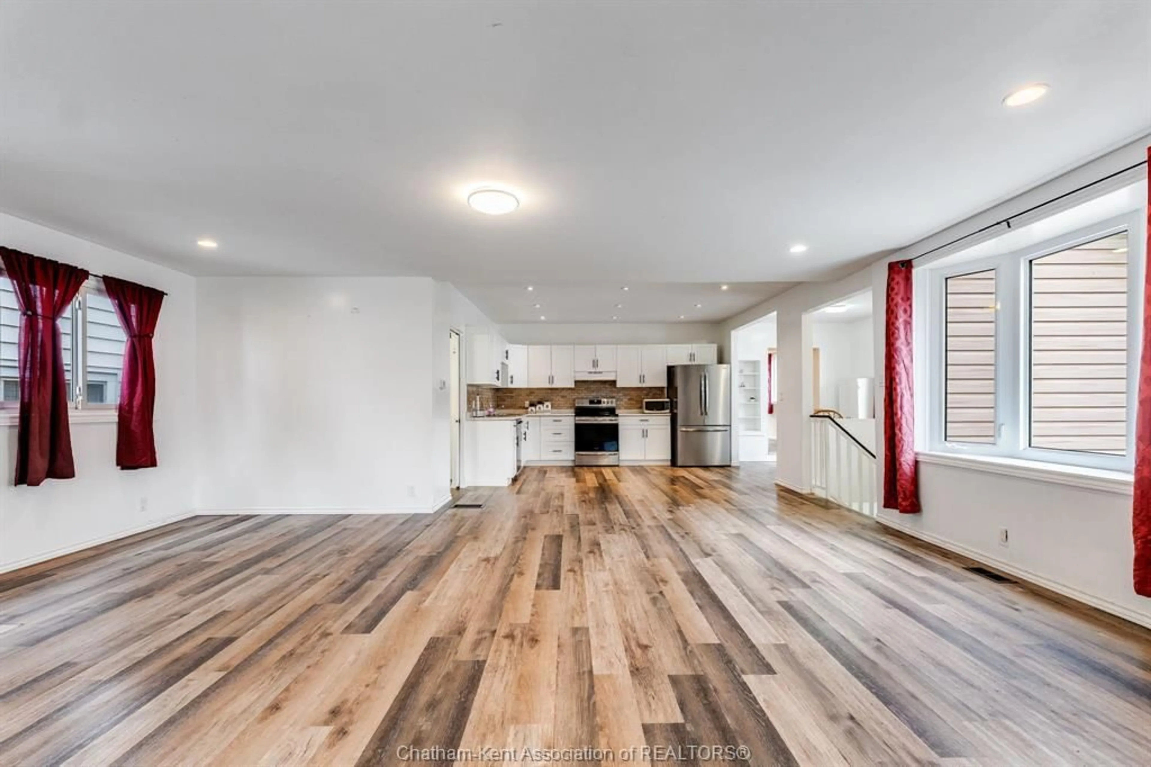Open concept kitchen, wood/laminate floor for 171 Edgar St, Chatham Ontario N7M 1V6