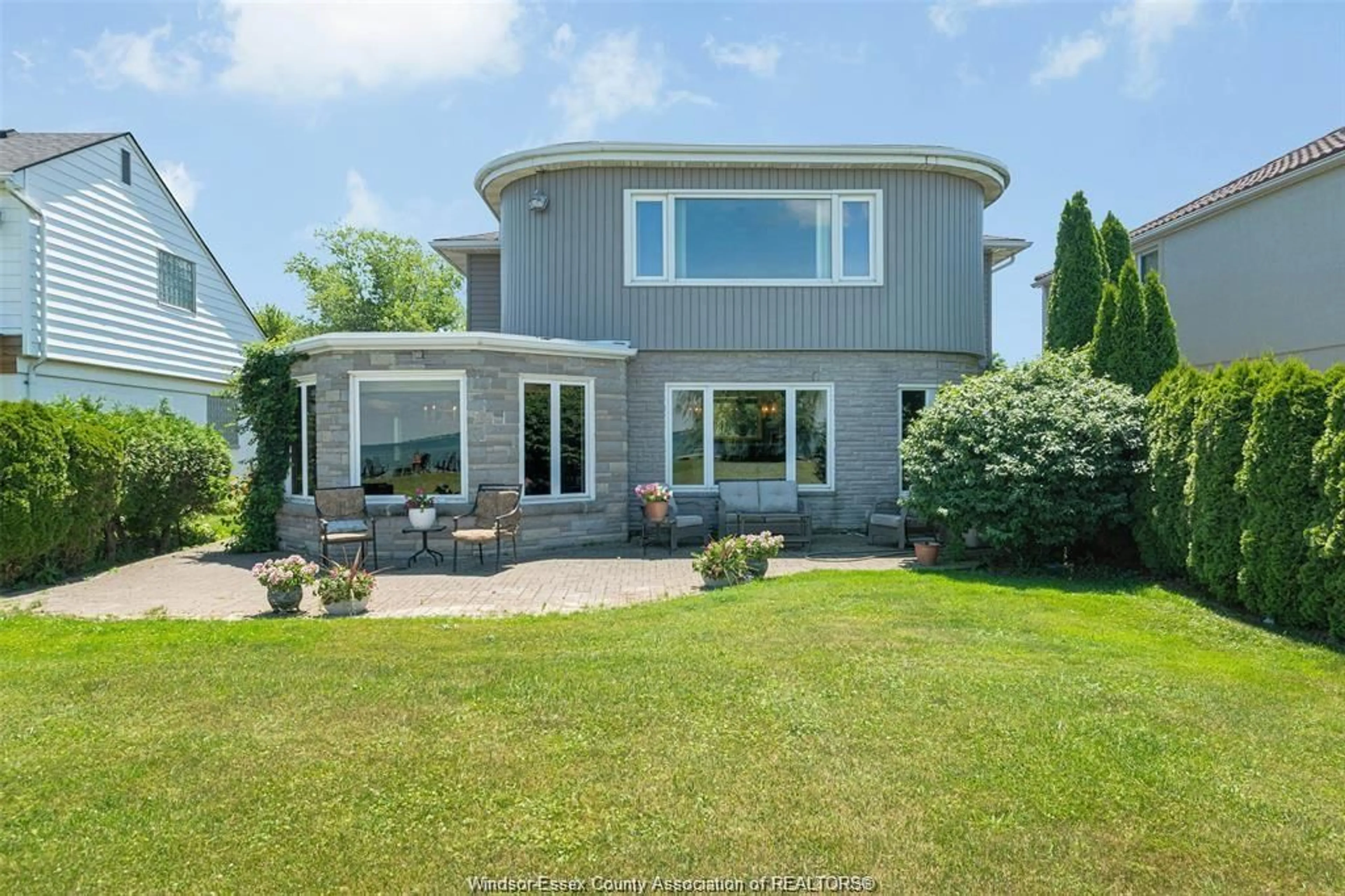 A pic from outside/outdoor area/front of a property/back of a property/a pic from drone, water/lake/river/ocean view for 11830 RIVERSIDE Dr, Windsor Ontario N8P 1A6
