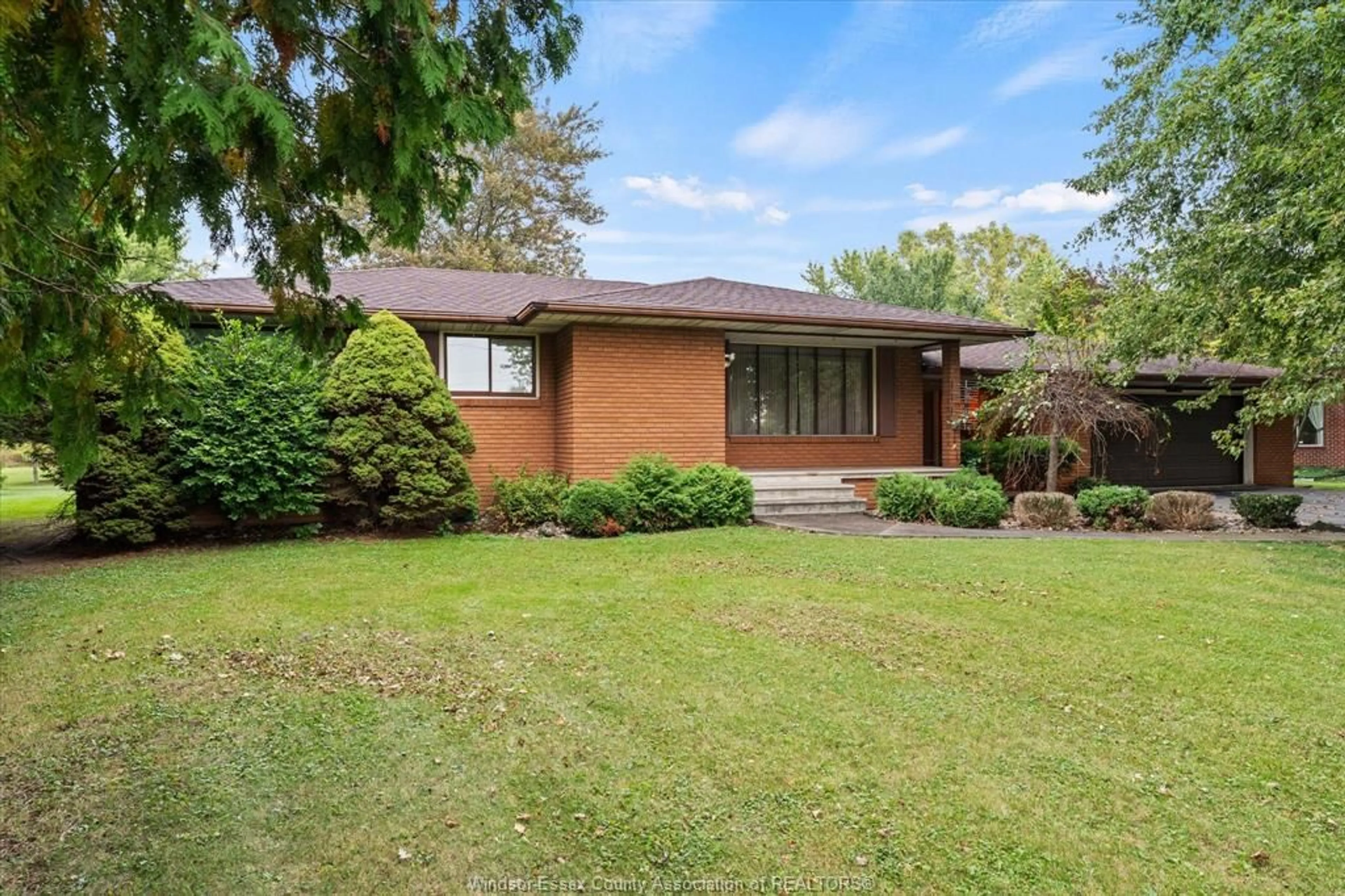 Home with brick exterior material, street for 8605 SNAKE Lane, LaSalle Ontario N9A 6Z6