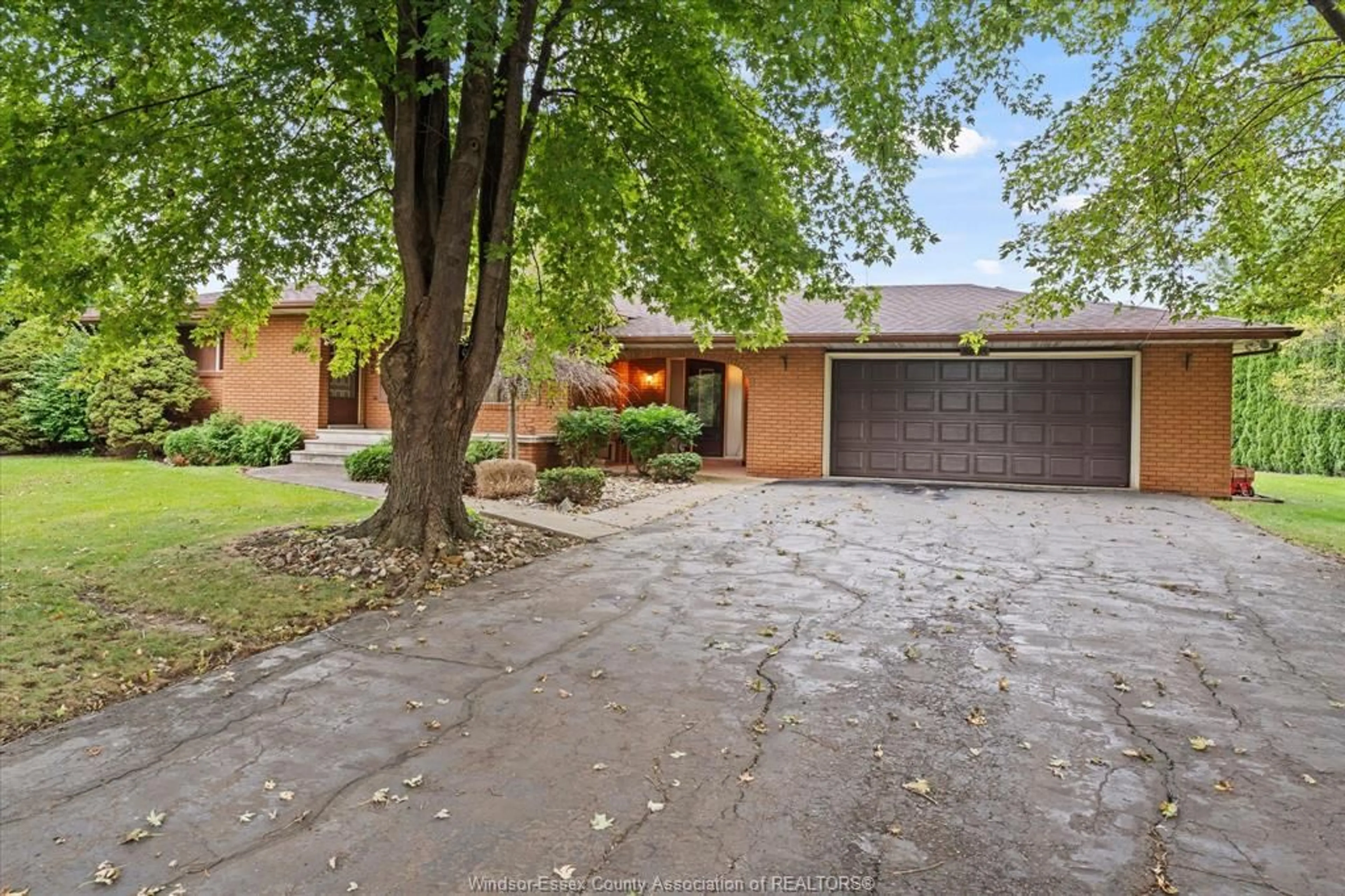 Home with brick exterior material, street for 8605 SNAKE Lane, LaSalle Ontario N9A 6Z6