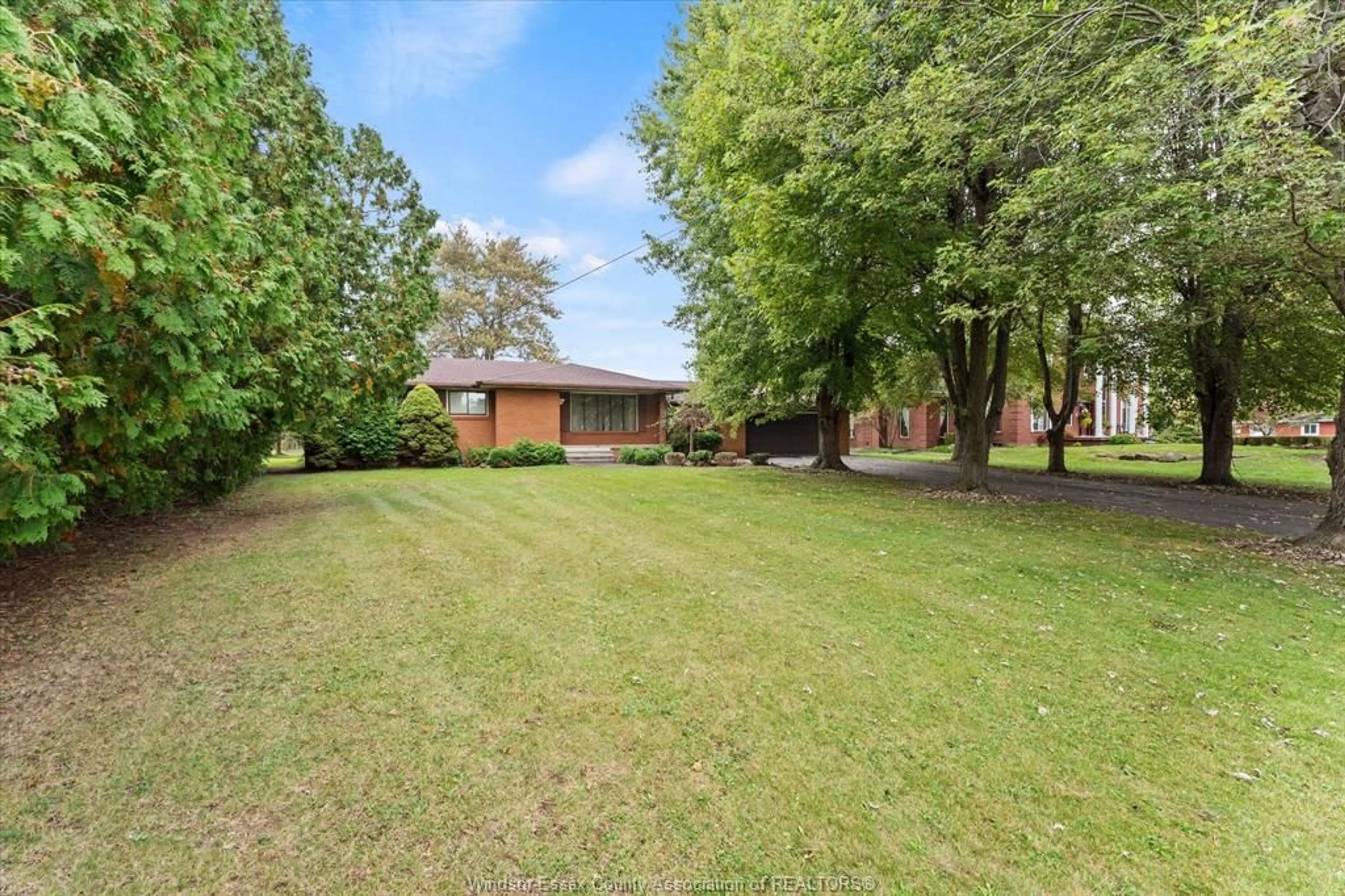 A pic from outside/outdoor area/front of a property/back of a property/a pic from drone, unknown for 8605 SNAKE Lane, LaSalle Ontario N9A 6Z6