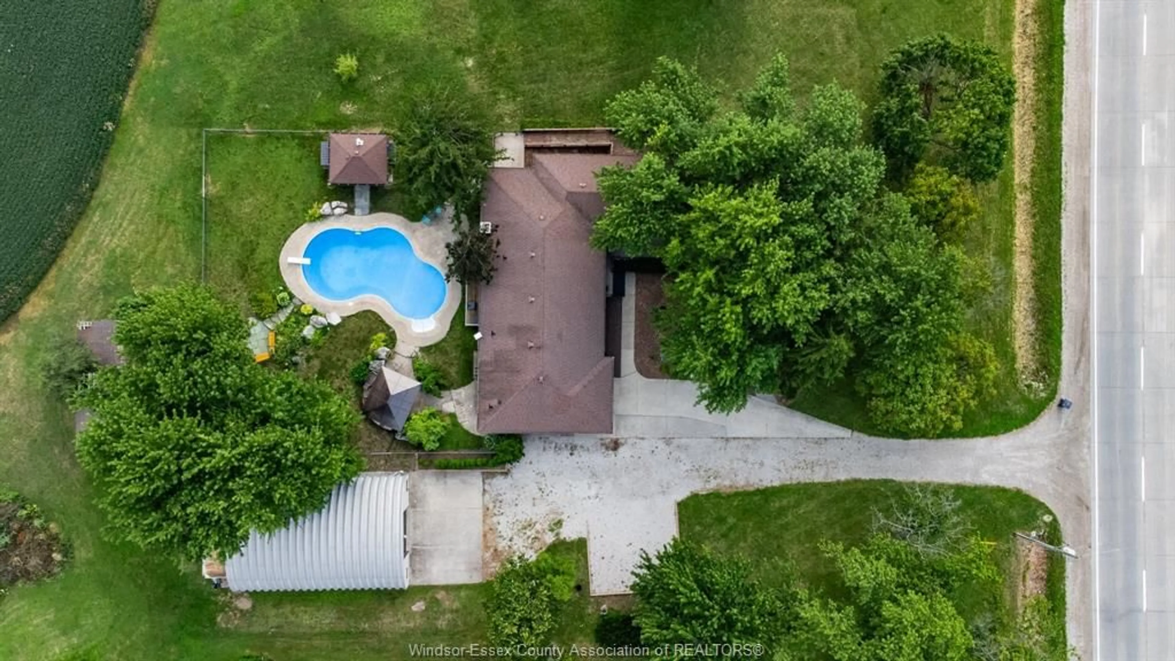 A pic from outside/outdoor area/front of a property/back of a property/a pic from drone, water/lake/river/ocean view for 6840 Highway 3, Tecumseh Ontario N0R 1K0