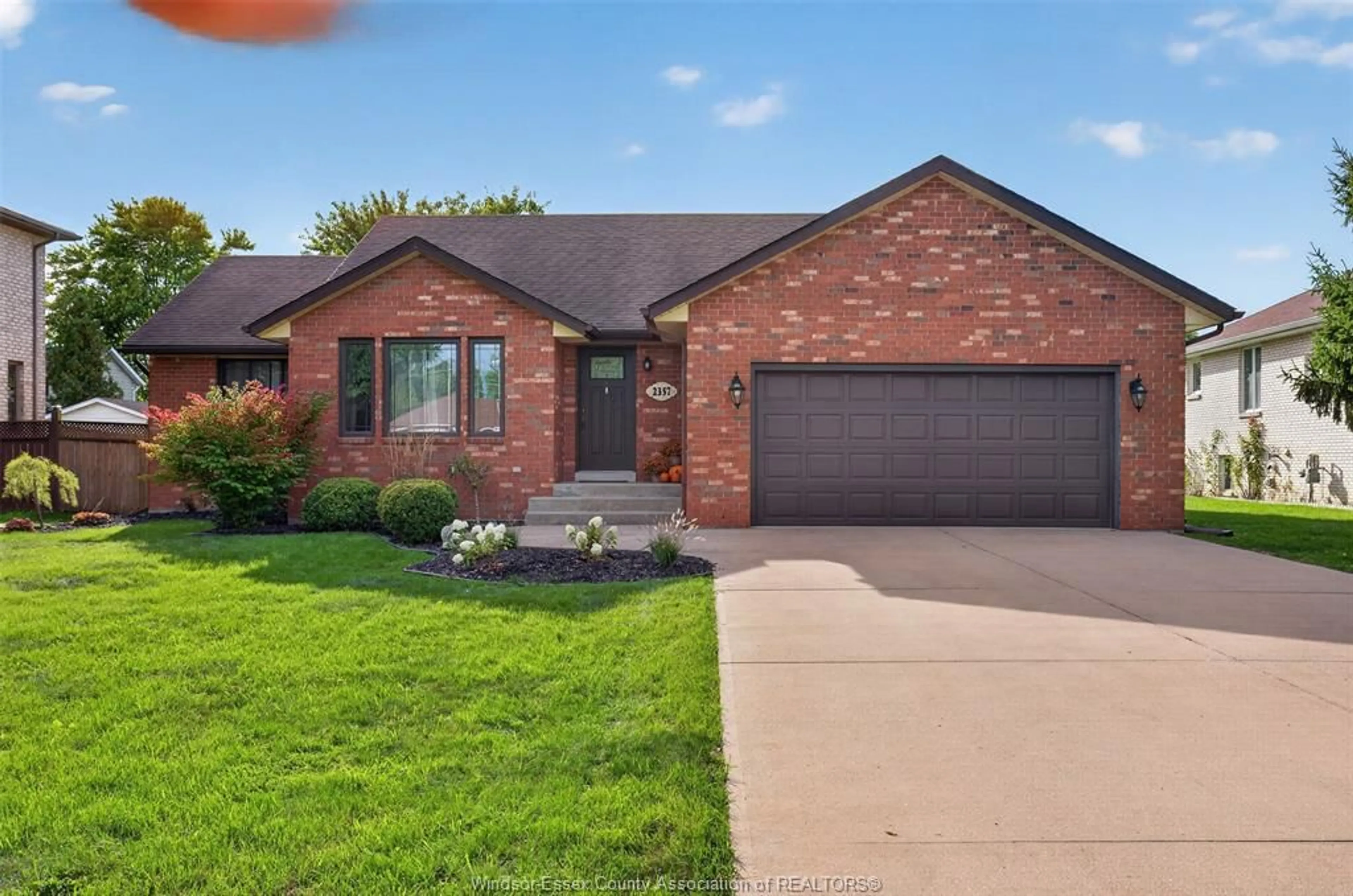 Home with brick exterior material, street for 2357 Docherty Dr, Tecumseh Ontario N8N 4R1