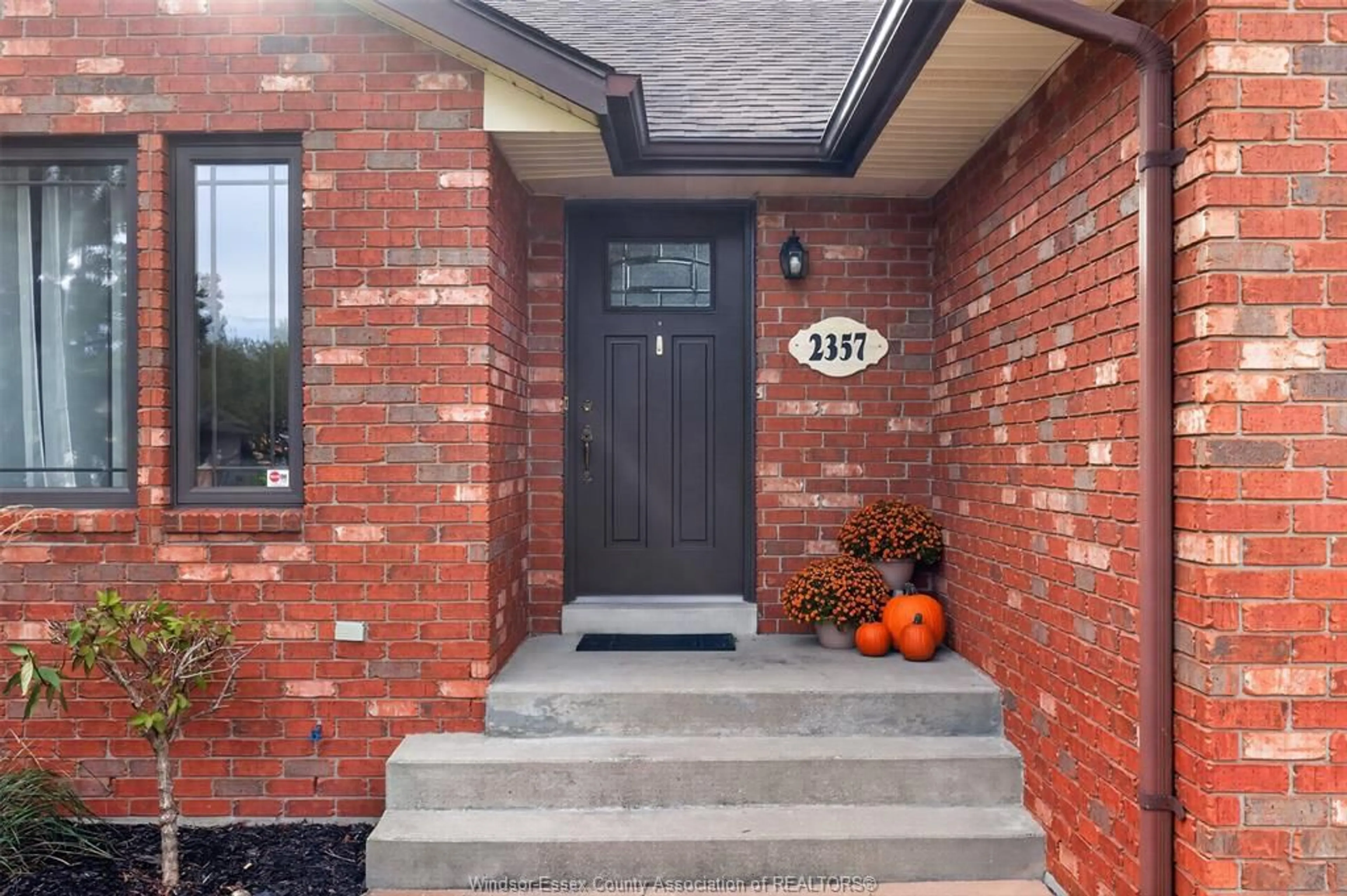 Home with brick exterior material, street for 2357 Docherty Dr, Tecumseh Ontario N8N 4R1