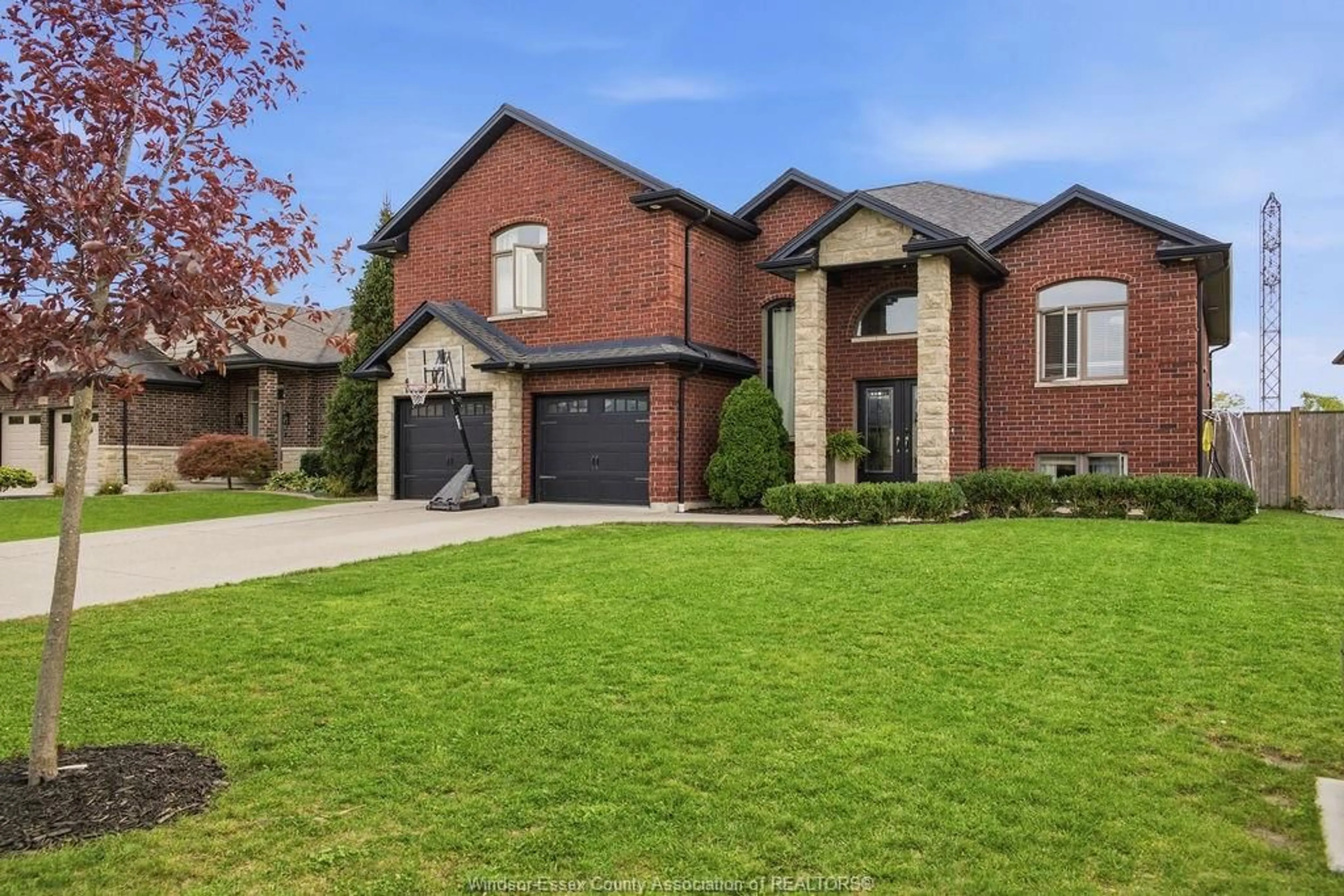 Home with brick exterior material, street for 1302 DEER RUN TRAIL, Lakeshore Ontario N0R 1A0