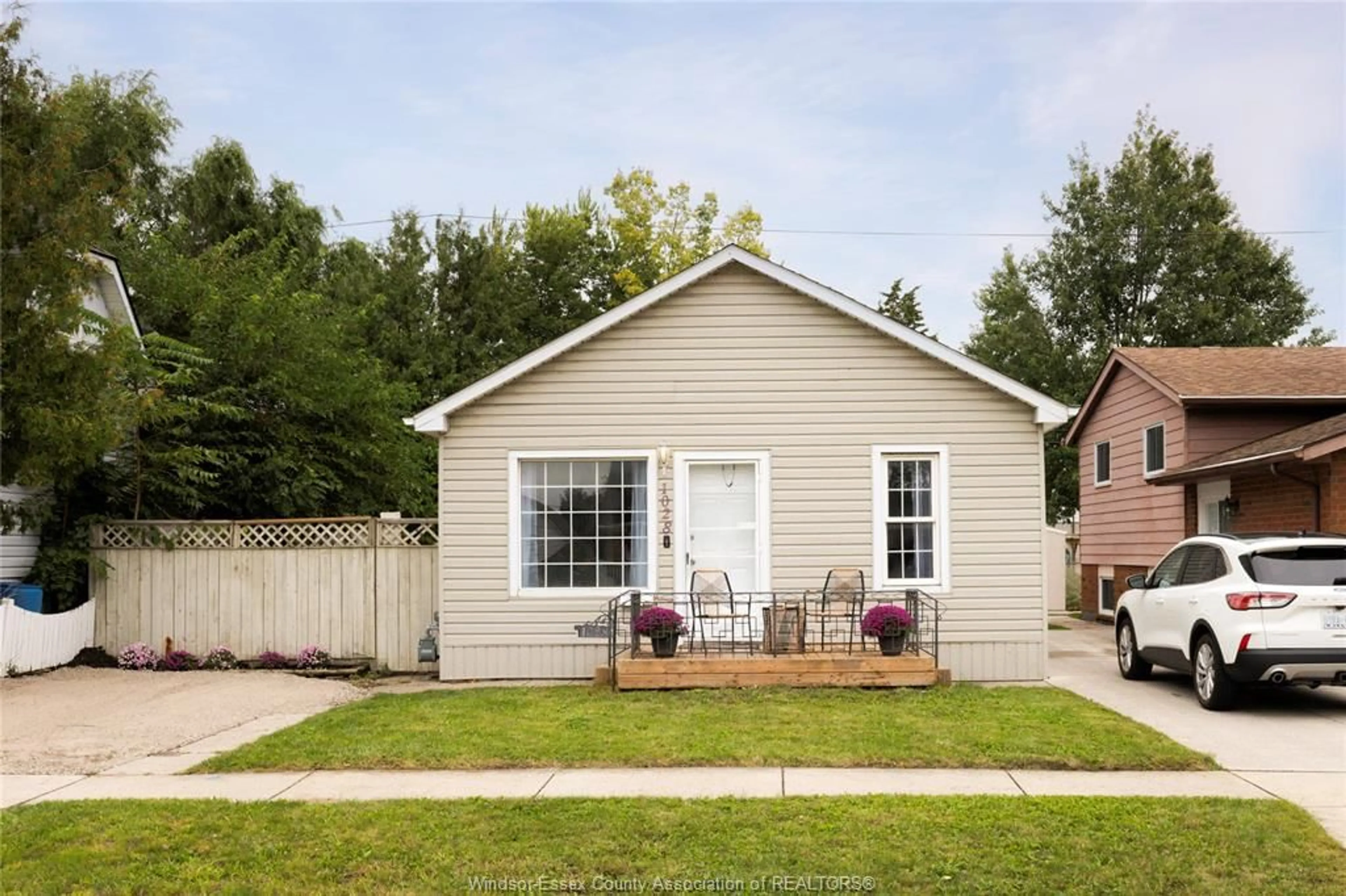 Home with vinyl exterior material, street for 1028 REEDMERE RD, Windsor Ontario N8S 2M1