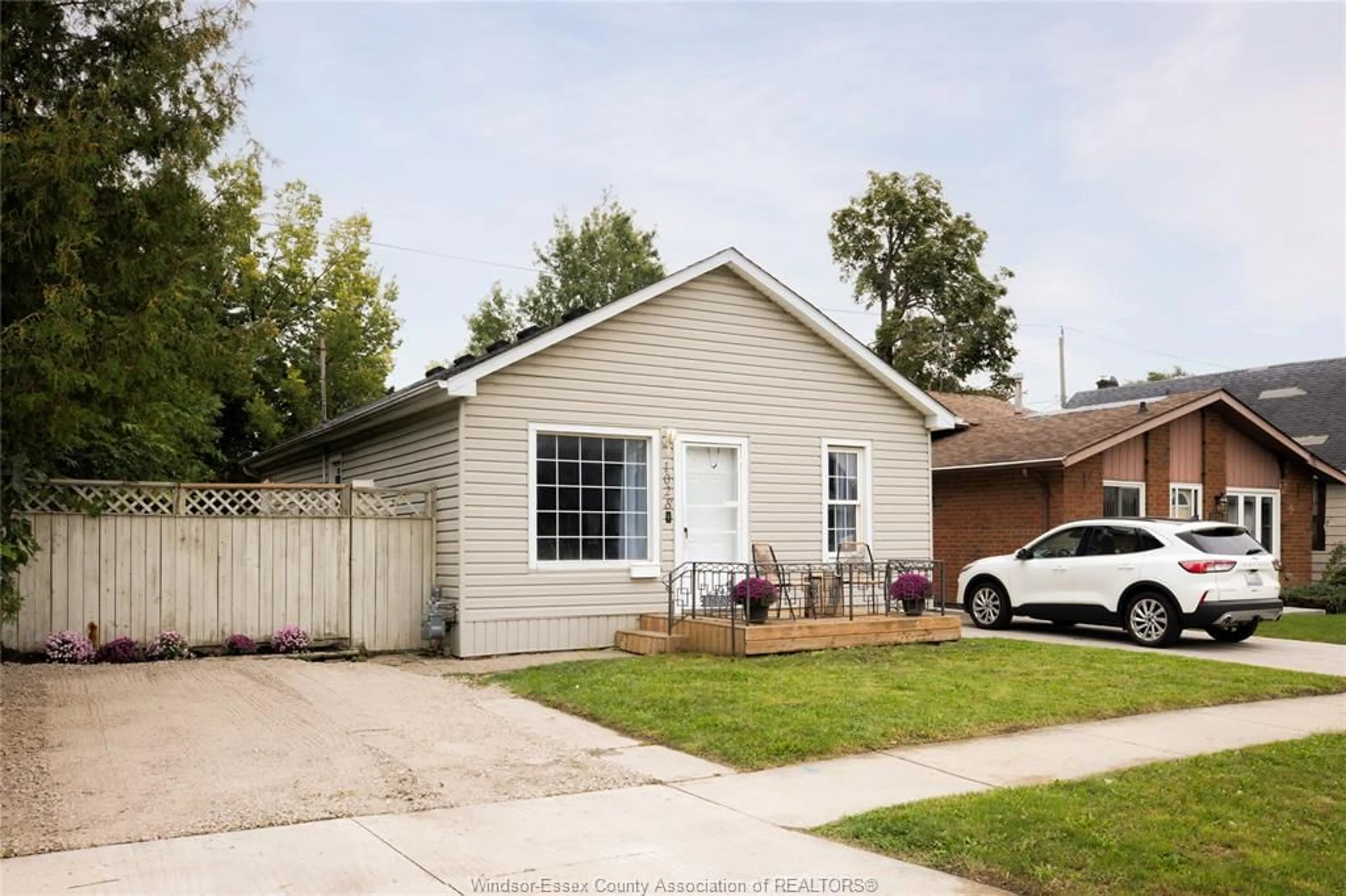 Home with vinyl exterior material, street for 1028 REEDMERE RD, Windsor Ontario N8S 2M1