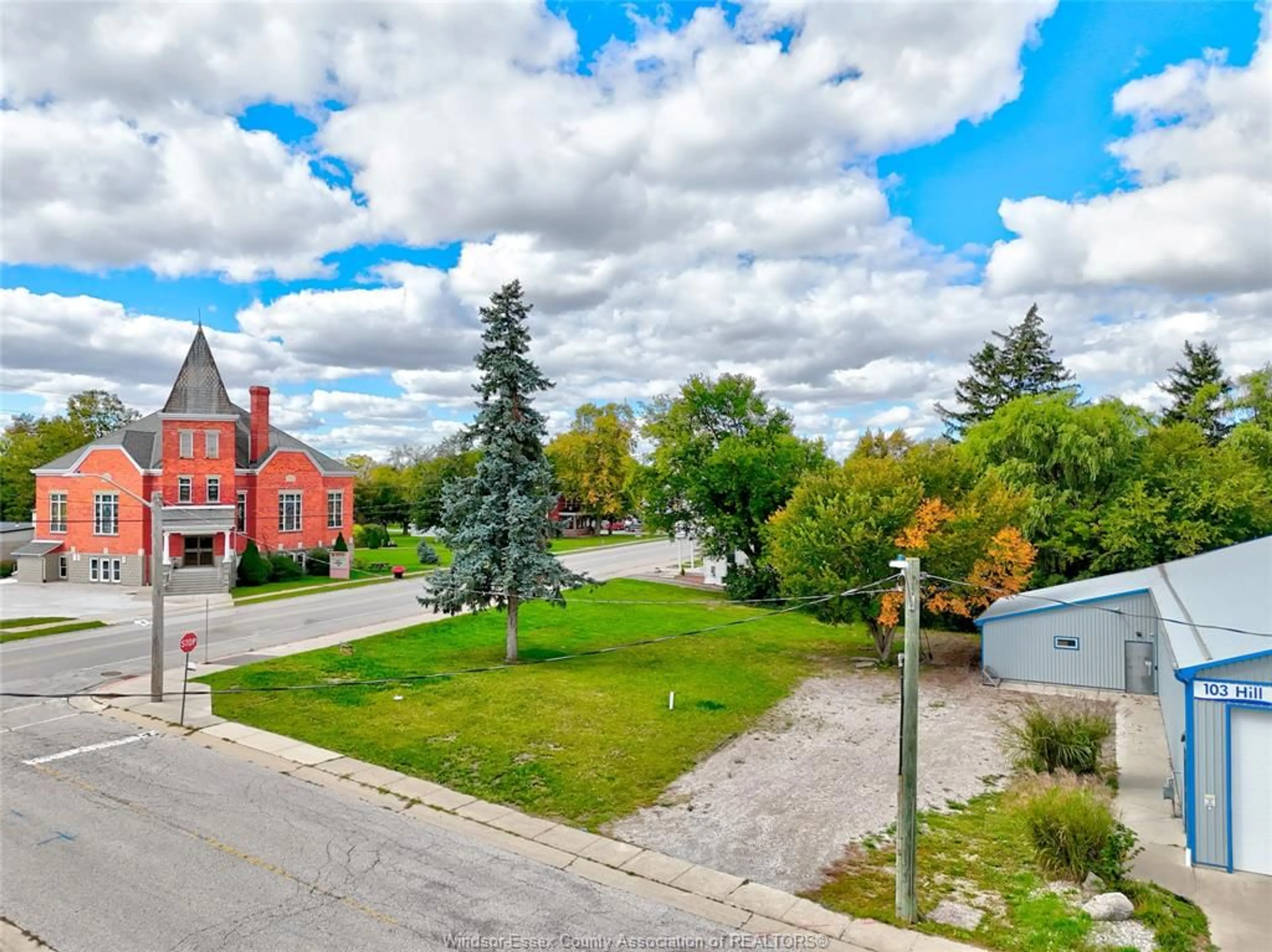 A pic from outside/outdoor area/front of a property/back of a property/a pic from drone, street for 134 COUNTY RD 34 E., Cottam Ontario N0R 1B0