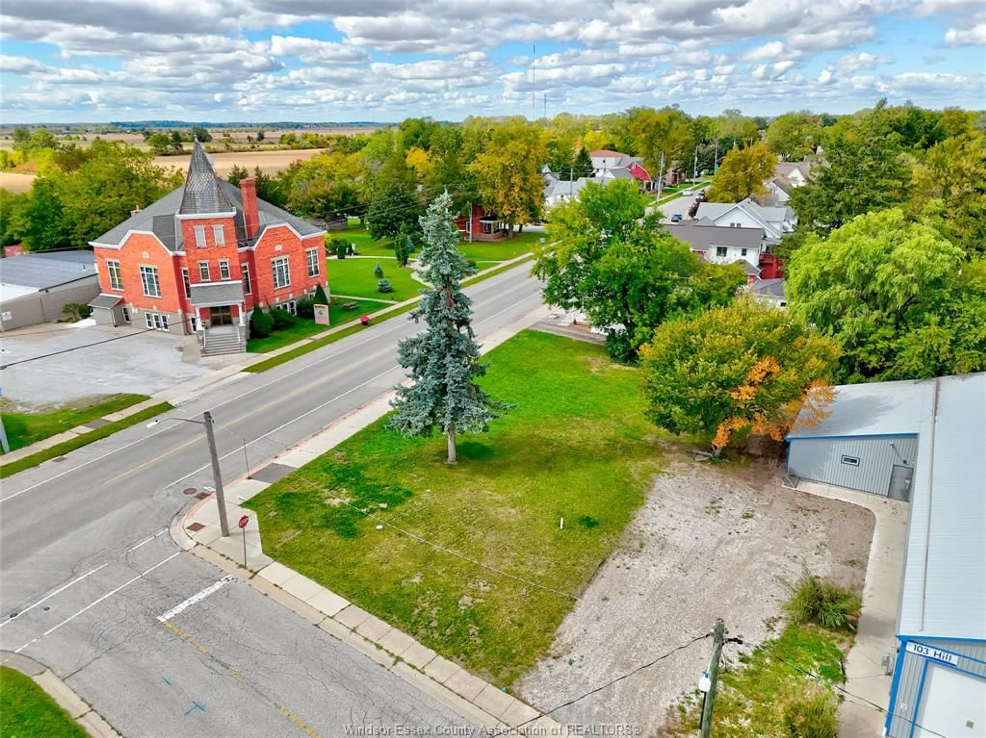 A pic from outside/outdoor area/front of a property/back of a property/a pic from drone, street for 134 COUNTY RD 34 E., Cottam Ontario N0R 1B0