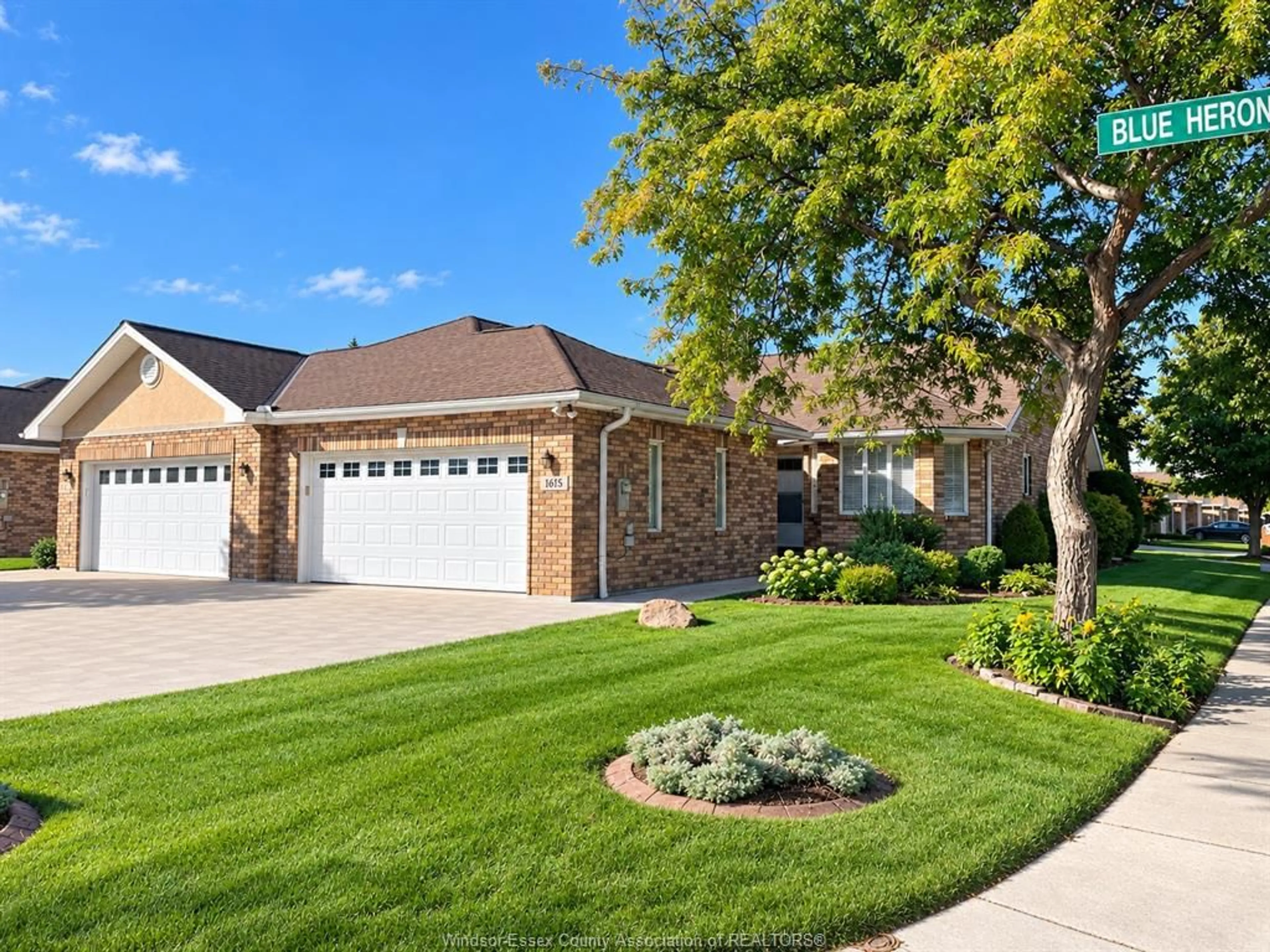 Home with brick exterior material, street for 1615 BLUE HERON, Windsor Ontario N8P 1L7