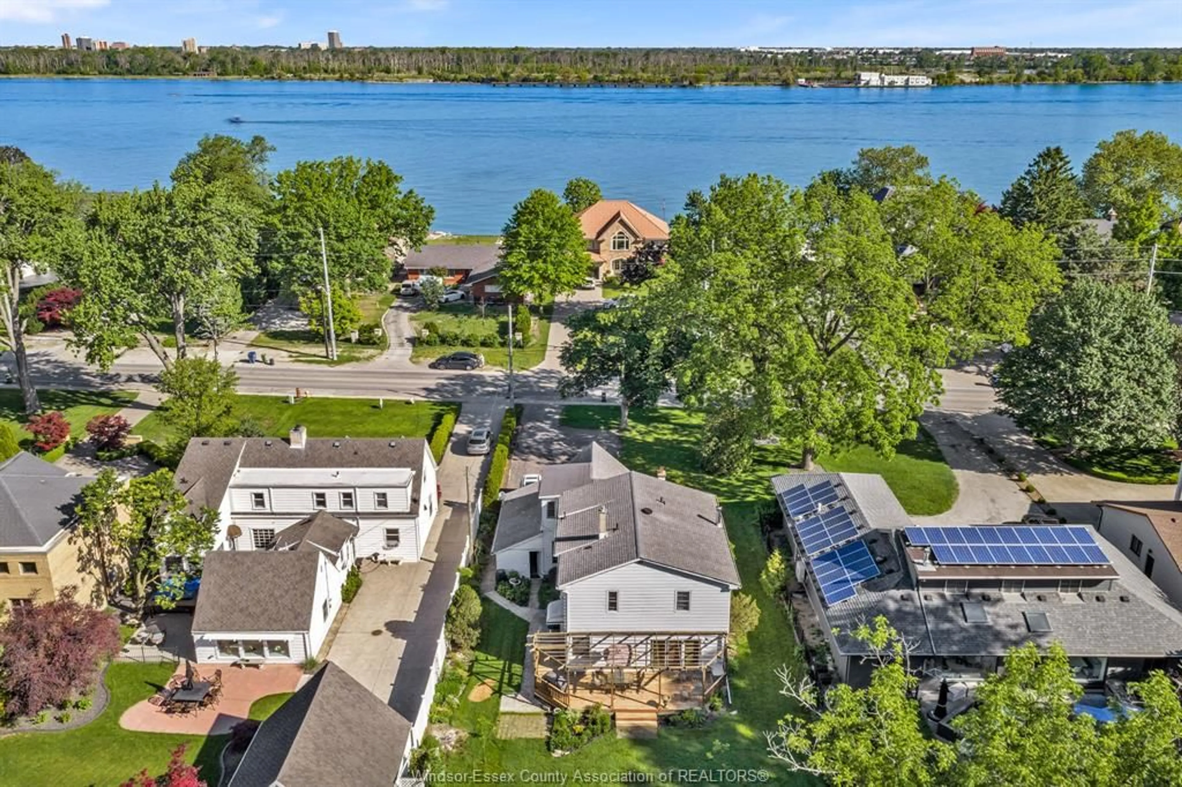 A pic from outside/outdoor area/front of a property/back of a property/a pic from drone, water/lake/river/ocean view for 6565 RIVERSIDE Dr, Windsor Ontario N8S 1C1