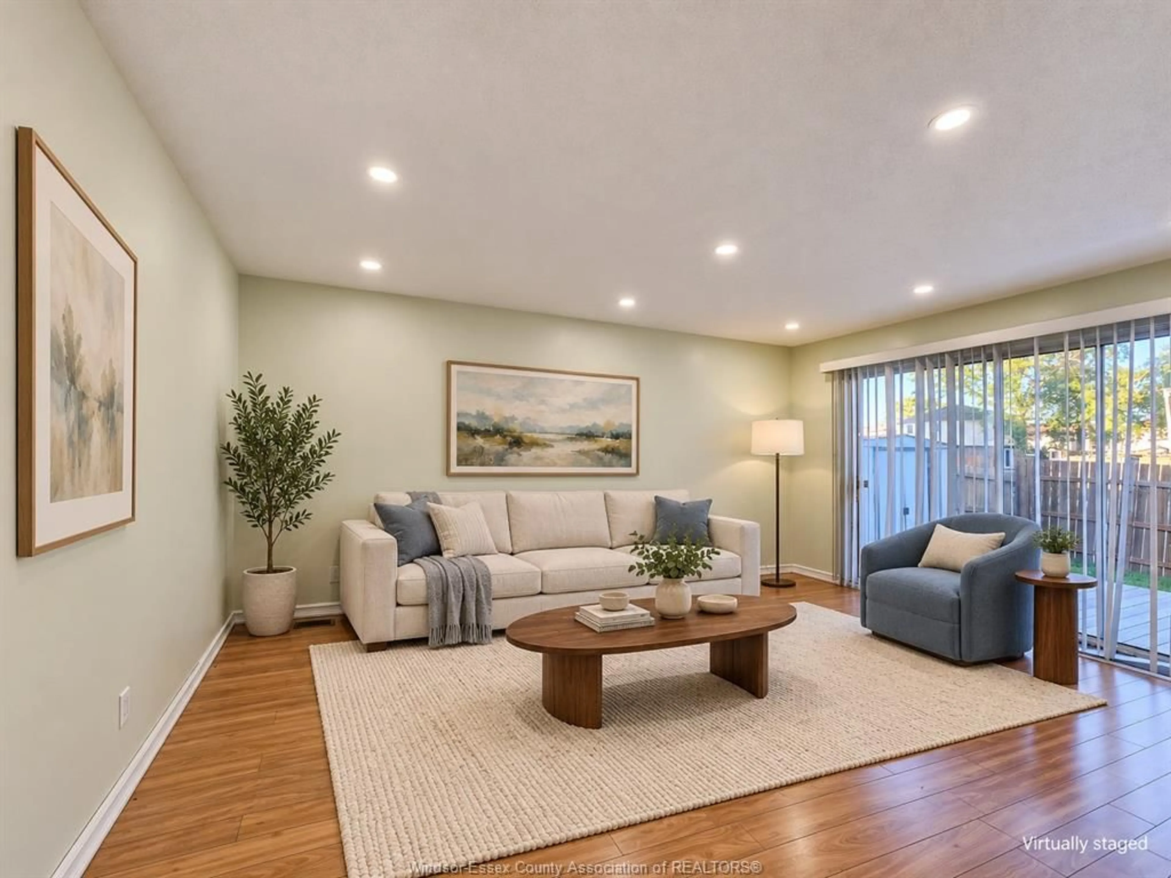 Living room with furniture, wood/laminate floor for 8370 GREGORY, Windsor Ontario N8S 4N4