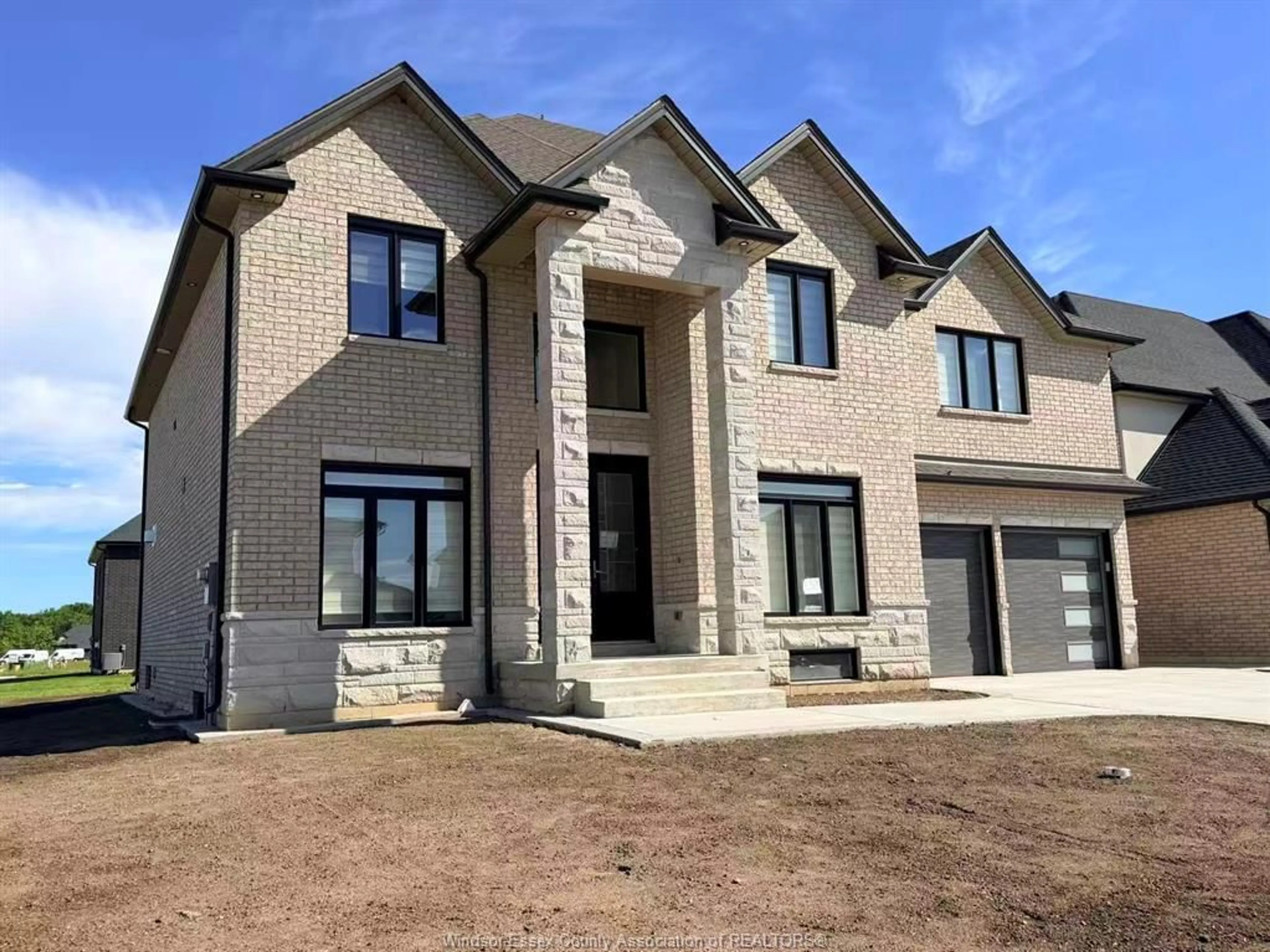 Home with brick exterior material, street for 570 ORCHARDS Cres, Windsor Ontario N9E 0B2
