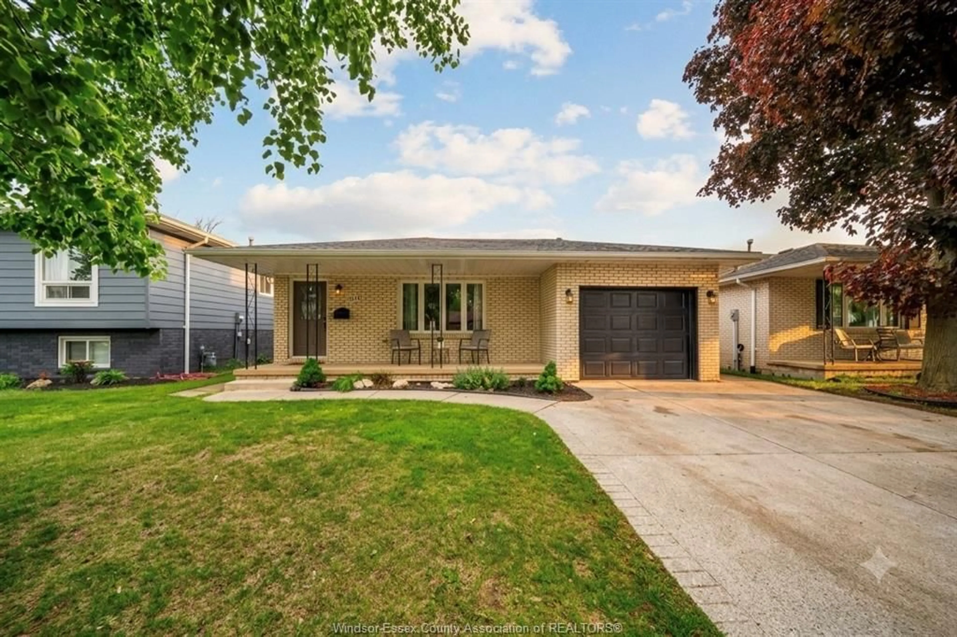 Home with brick exterior material, street for 10348 LONSDALE Cres, Windsor Ontario N8R 2E3
