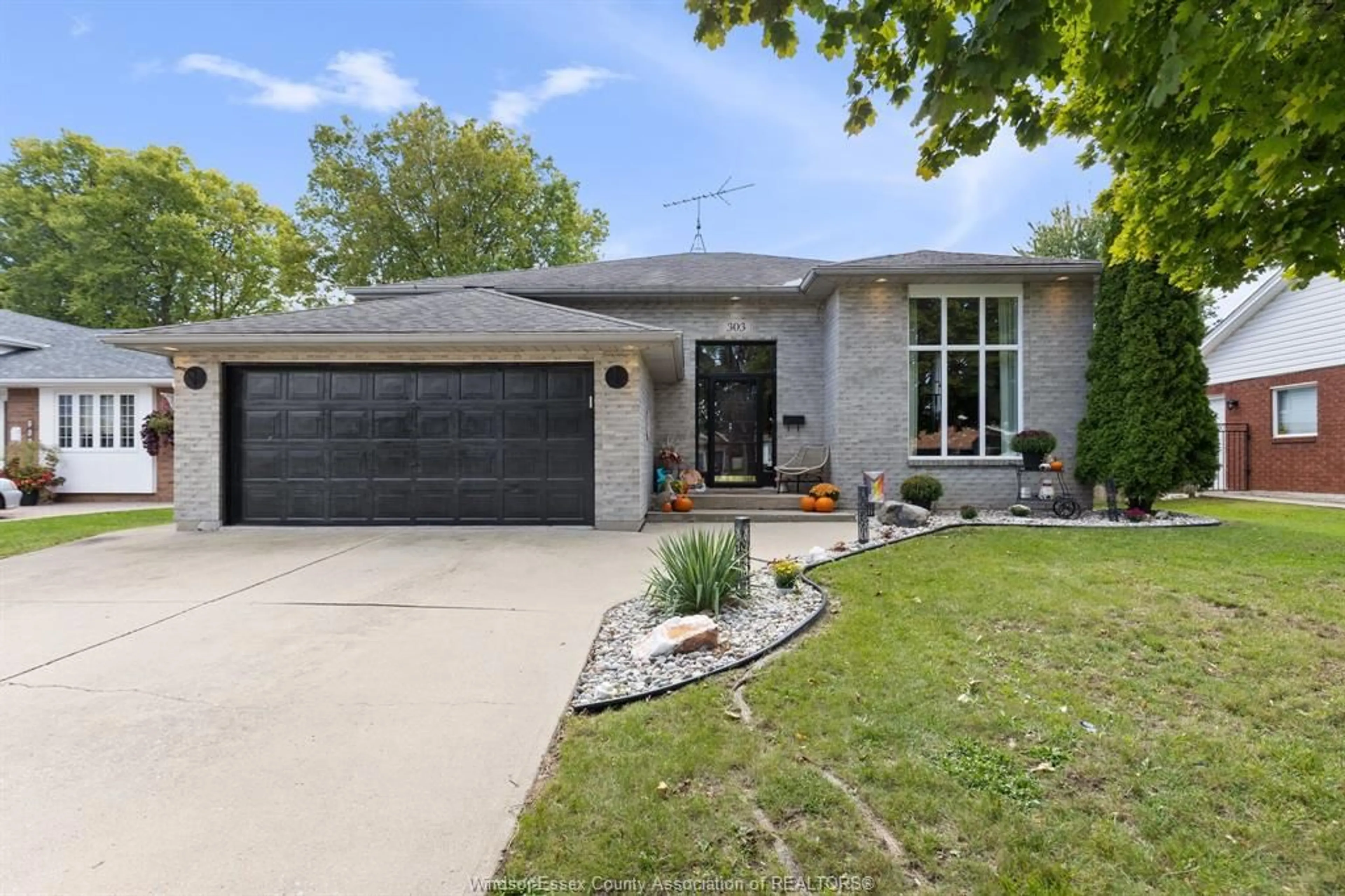 Home with brick exterior material, street for 303 STONE RIDGE Ave, Amherstburg Ontario N9V 3W4