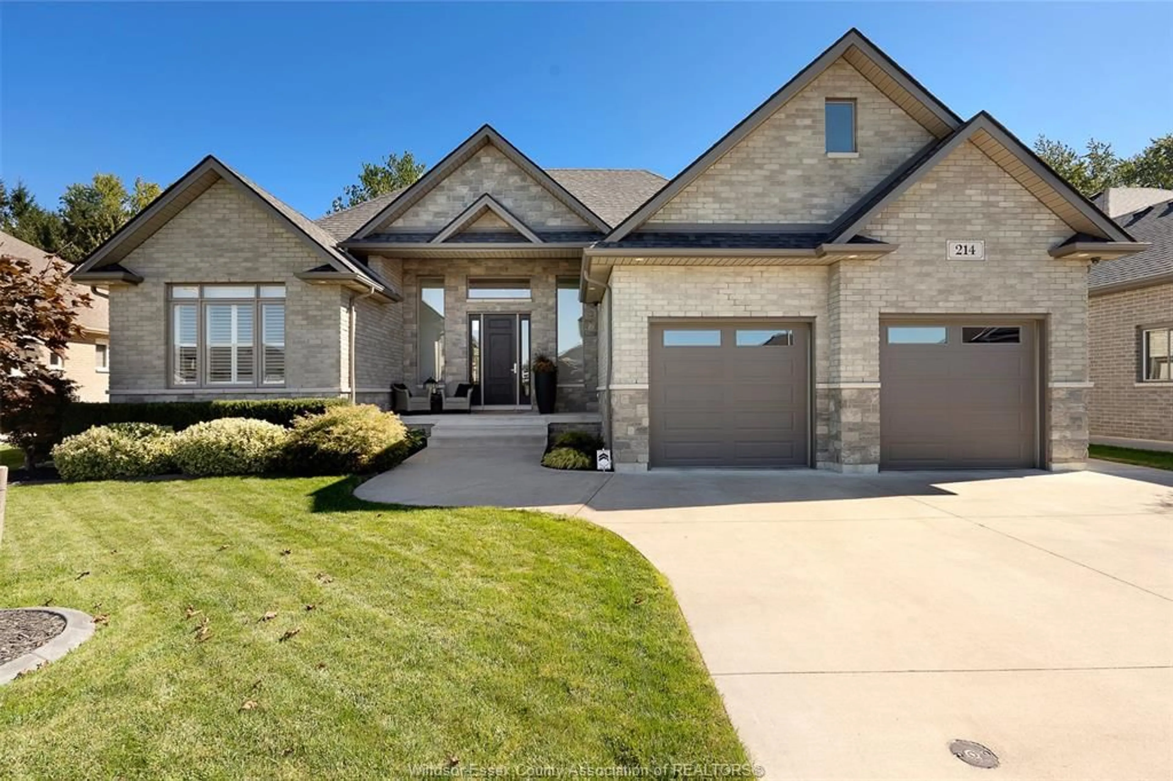 Home with brick exterior material, street for 214 Bernath St, Kingsville Ontario N9Y 0E6