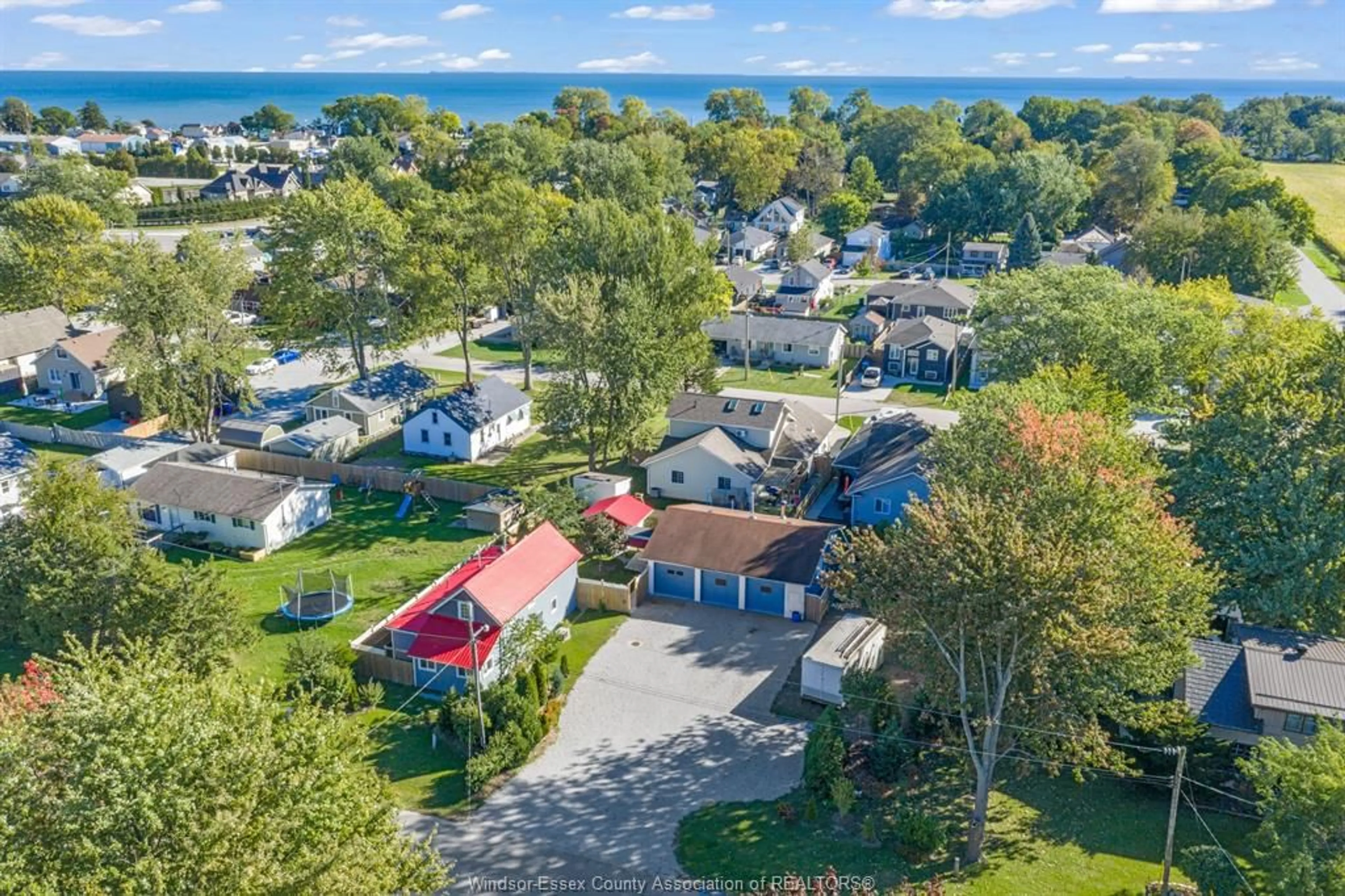 A pic from outside/outdoor area/front of a property/back of a property/a pic from drone, water/lake/river/ocean view for 1057 Oak Ave, Kingsville Ontario N9Y 3T6